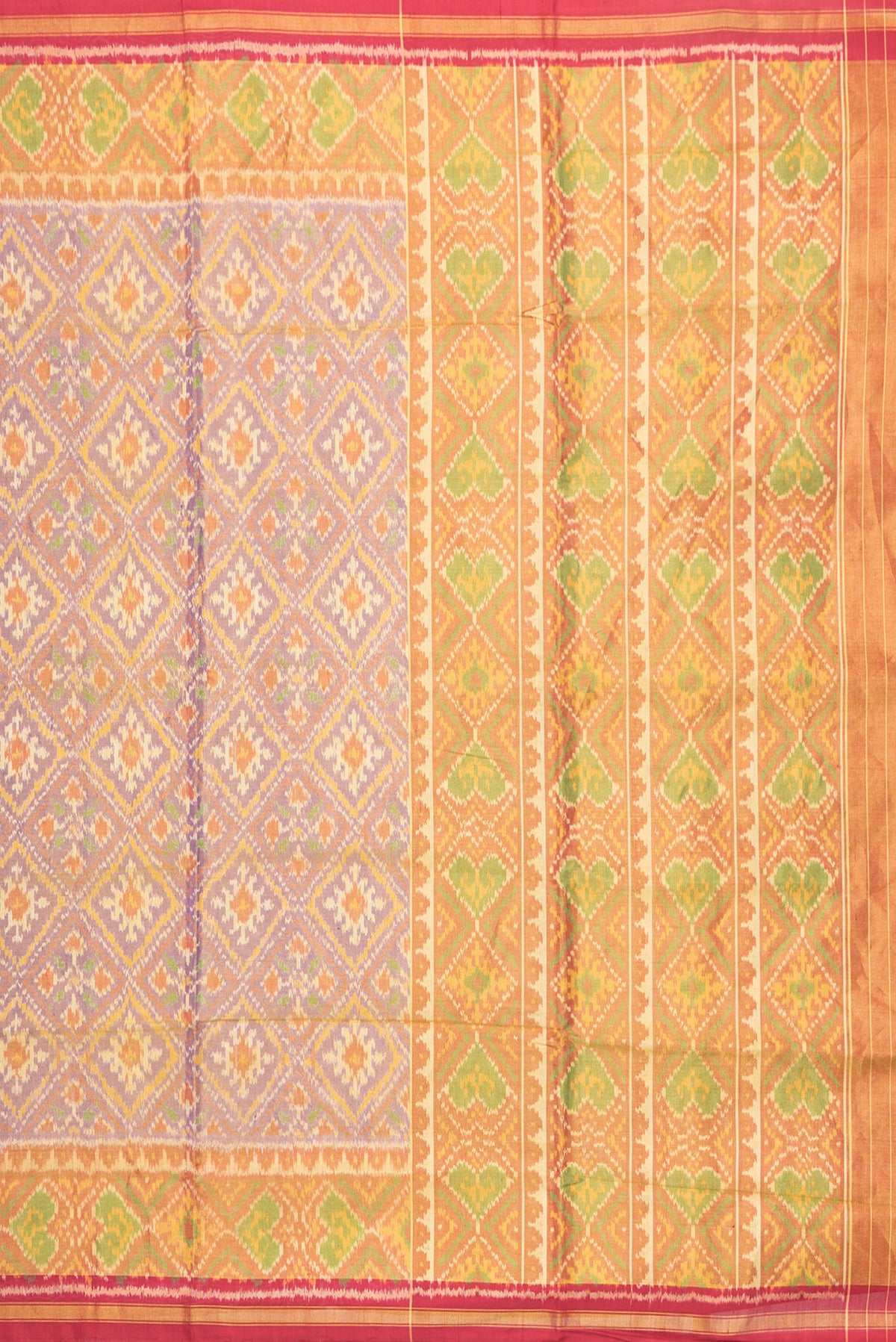 Close up image of the pallu of Lavender Dual Tone Double Ikat Saree with Ikat Print on the body and Zari Border. 