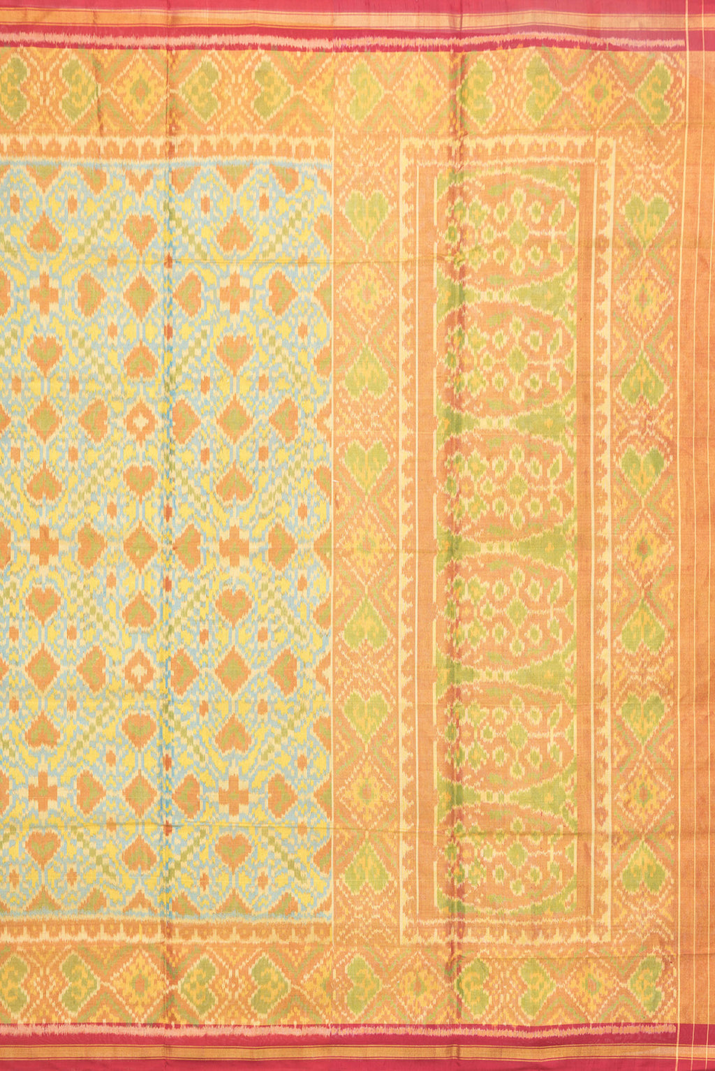 Close up image of the pallu of Sky Blue Dual Tone Double Ikat Saree with Ikat Print on the body and Zari Border. 