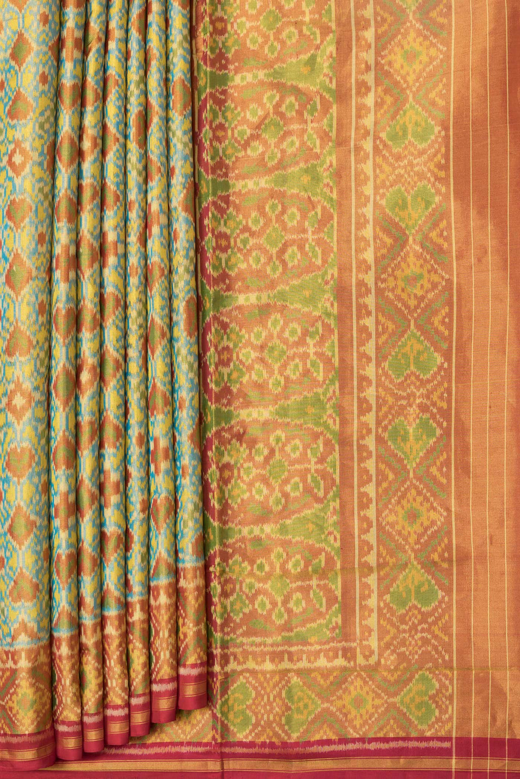 Pleats and pallu of Sky Blue Dual Tone Double Ikat Saree with Ikat Print on the body and Zari Border. 