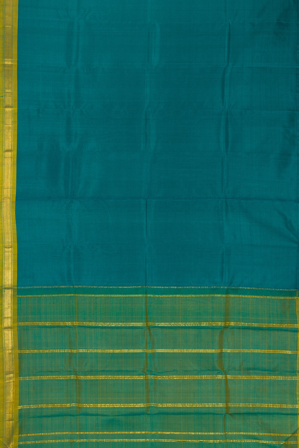 Flat view of Peacock Blue Dual Tone Kanchipuram Silk Saree with Plain Body and Zari Border. 