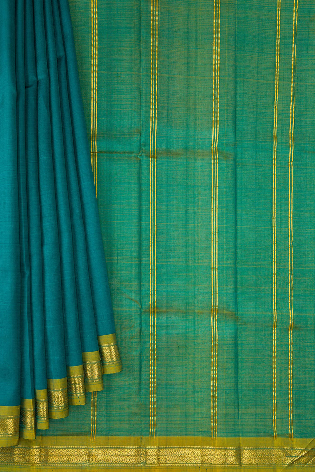 Pleats and pallu of Peacock Blue Dual Tone Kanchipuram Silk Saree with Plain Body and Zari Border. 