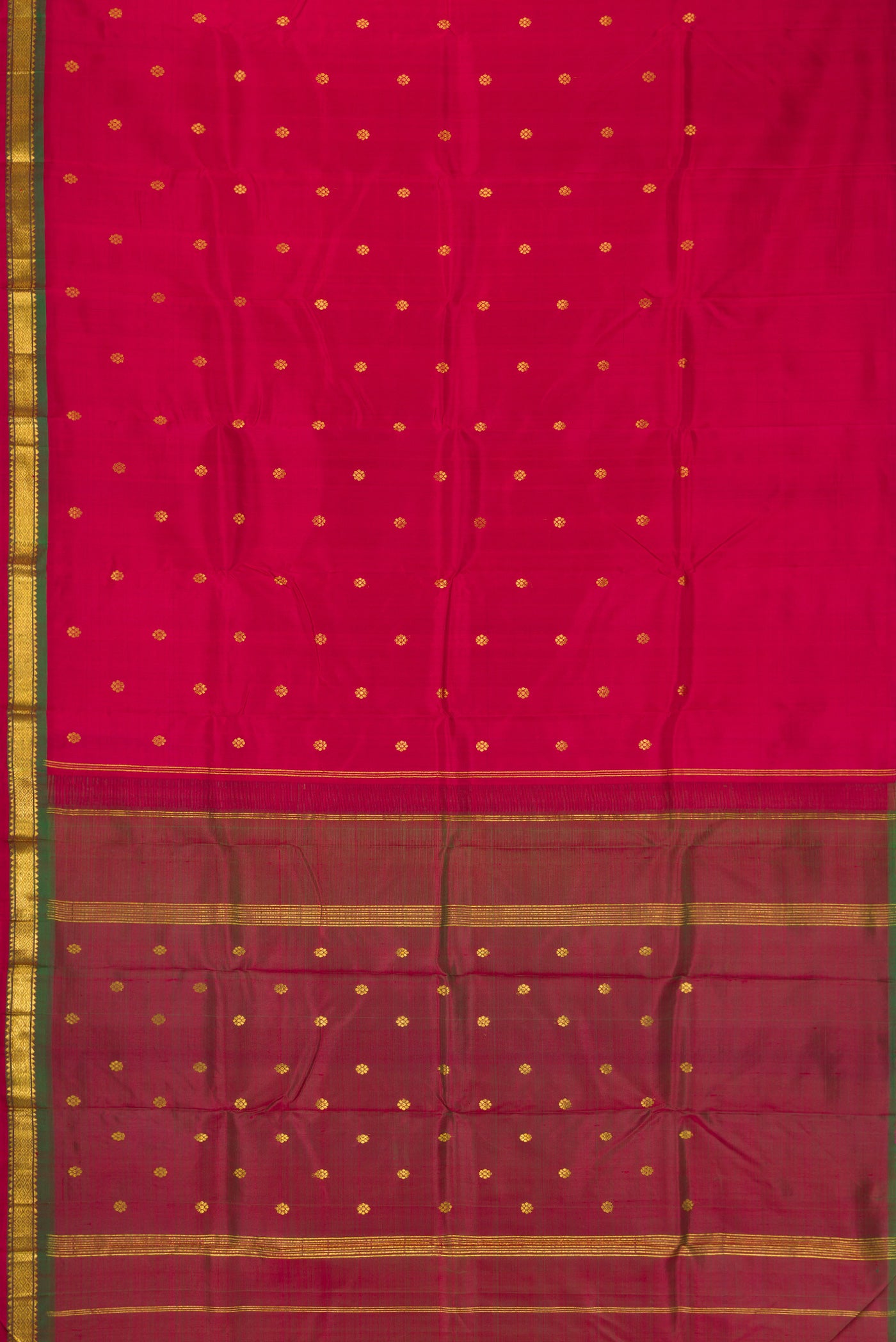 Maroon Dual Tone Kanchipuram Silk Saree with Zari Butta on the body and Zari Border.  displayed on a mannequin