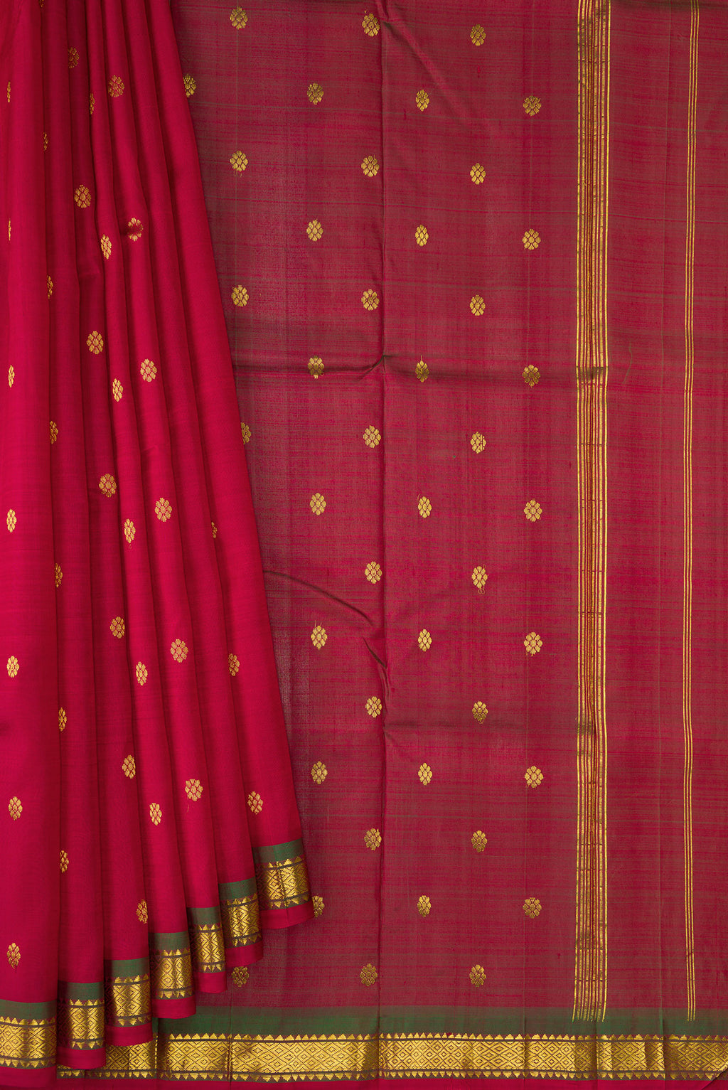Pleats and pallu of Maroon Dual Tone Kanchipuram Silk Saree with Zari Butta on the body and Zari Border. 