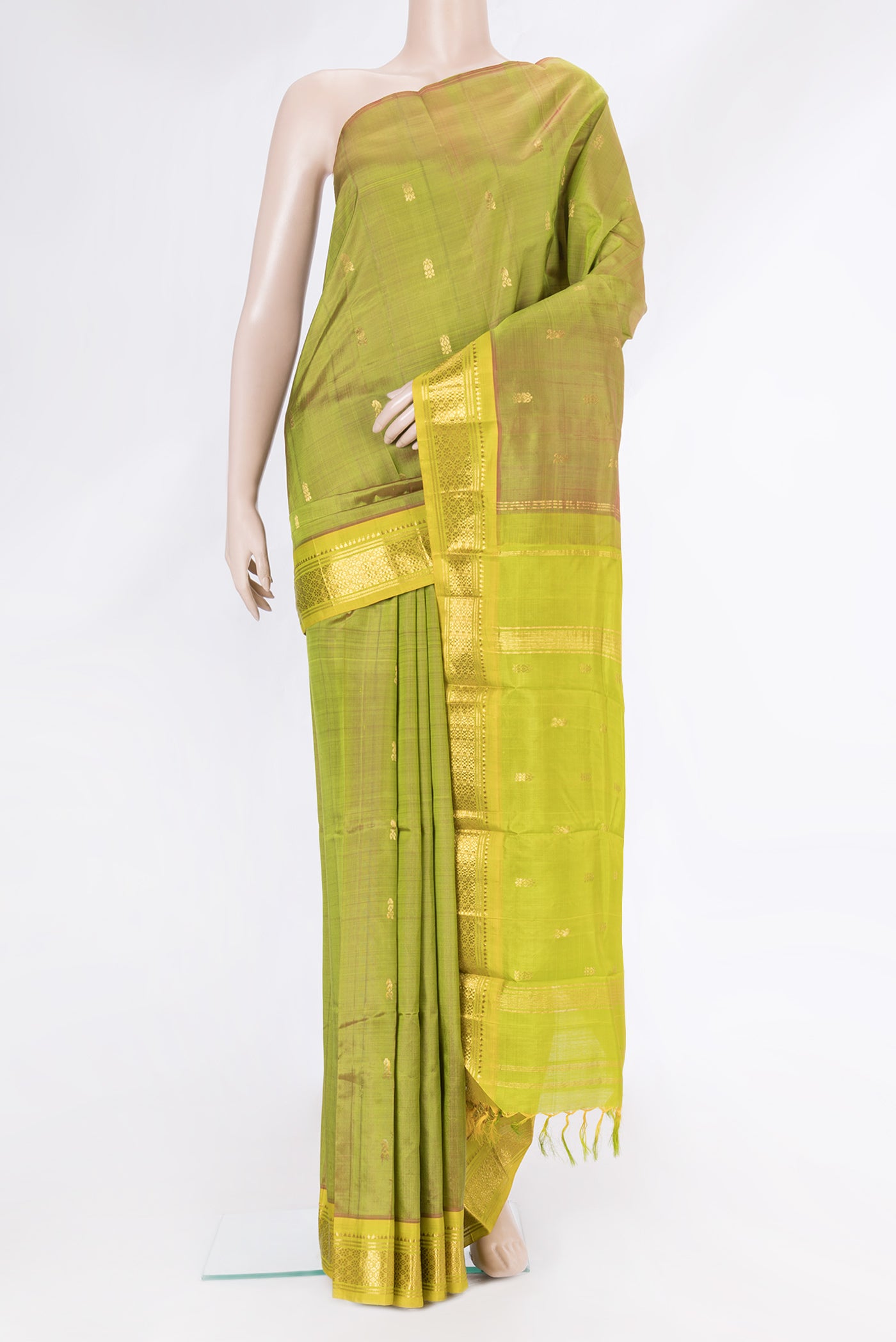 Mehandi Green Dual Tone Kanjivaram Silk Saree with Zari Butta on the body and One Side Border.  displayed on a mannequin