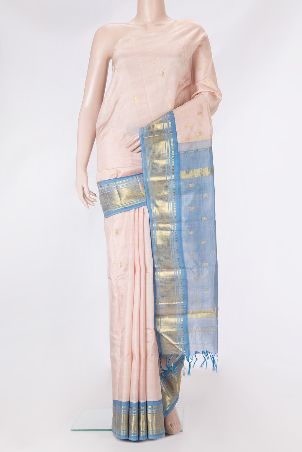 Rose Gold Kanjivaram Silk Saree with Zari Butta on the body and One Side Border.  displayed on a mannequin