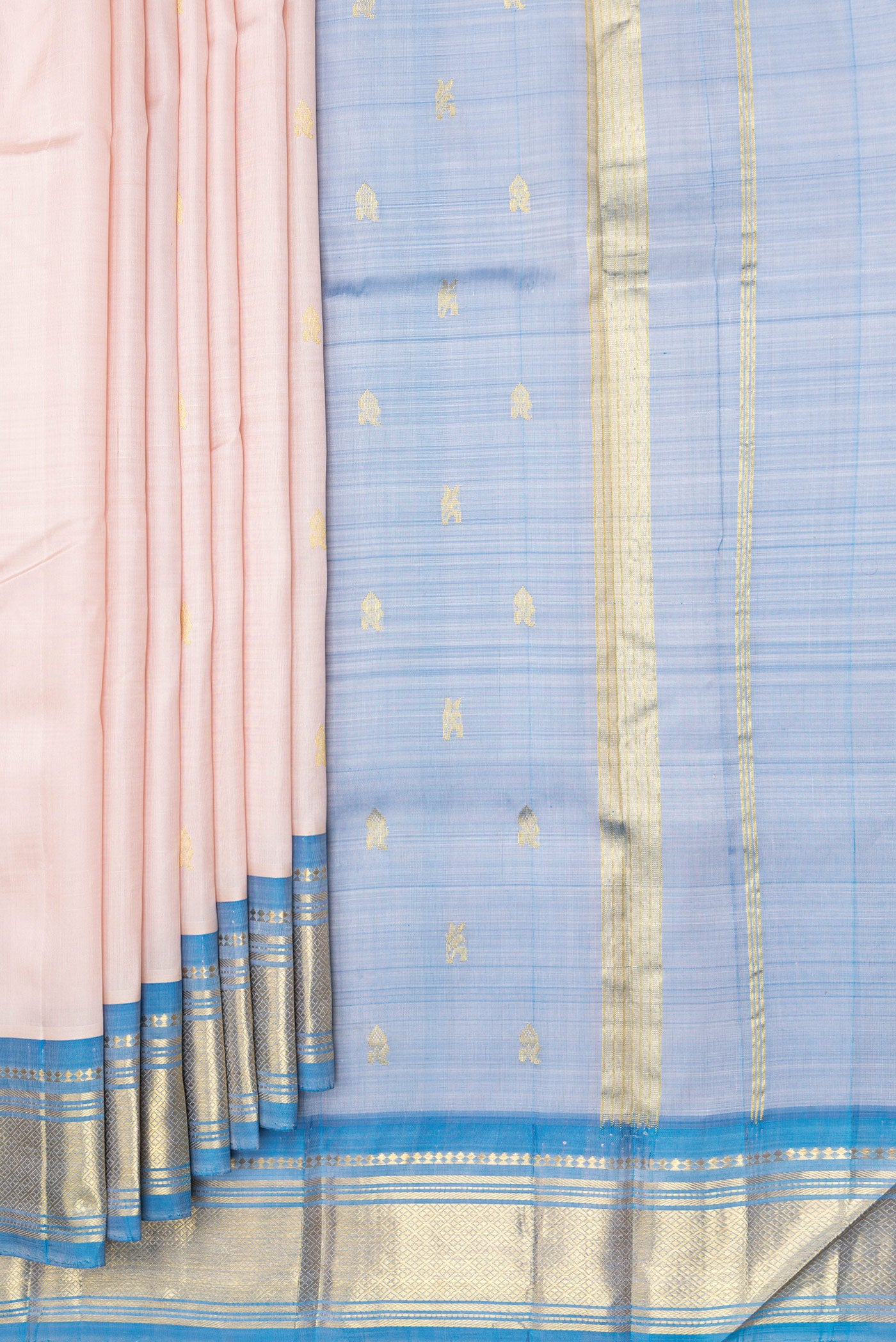 Pleats and pallu of Rose Gold Kanjivaram Silk Saree with Zari Butta on the body and One Side Border. 