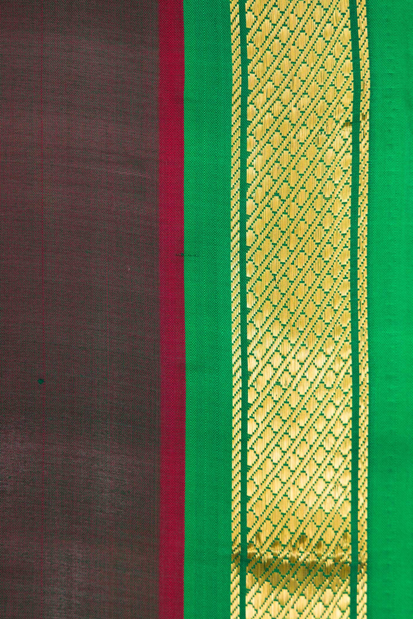 Border image of Bottle Green Dual Tone Kanchipuram Silk Saree with Plain Body and Zari Border. 