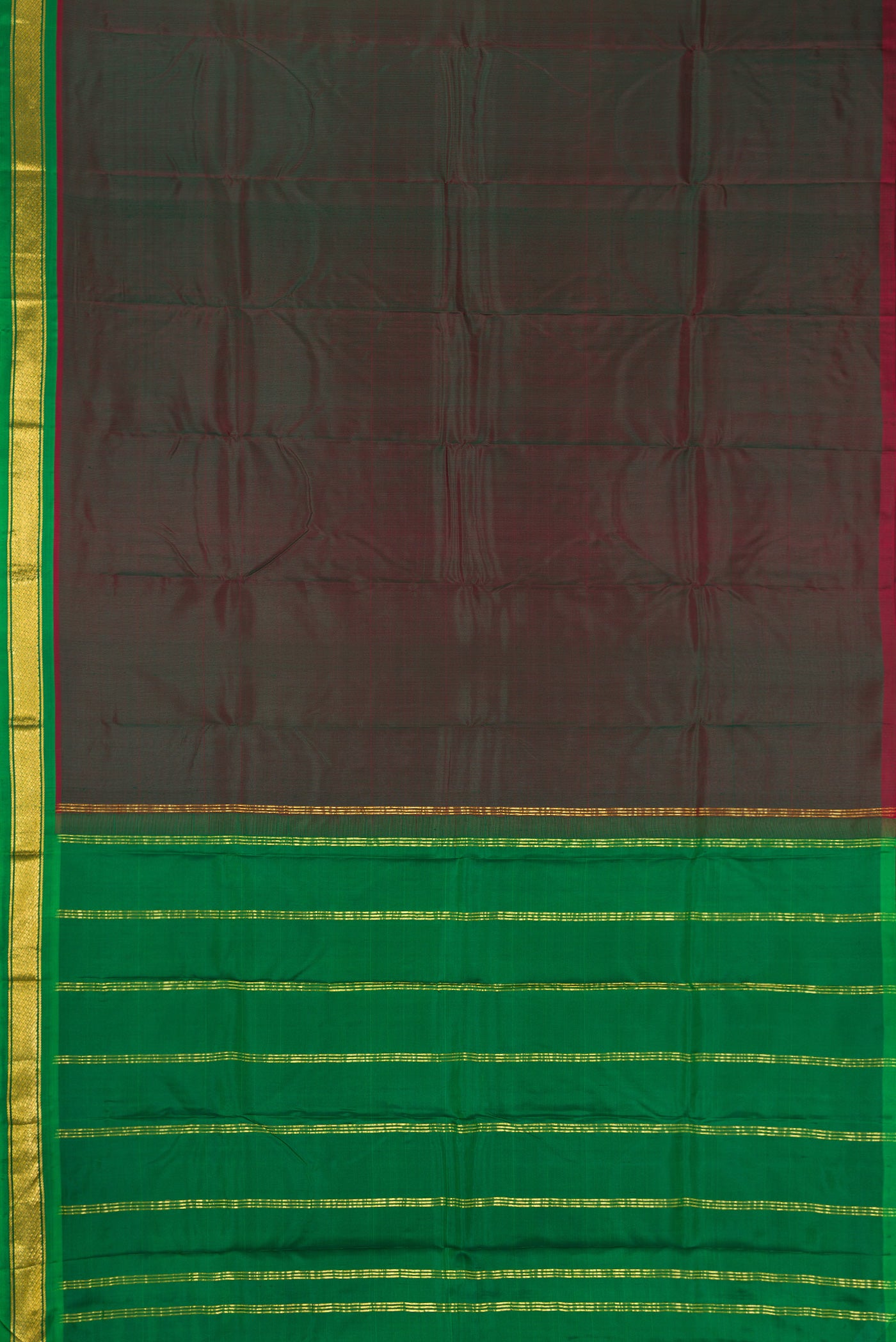Bottle Green Dual Tone Kanchipuram Silk Saree with Plain Body and Zari Border.  displayed on a mannequin