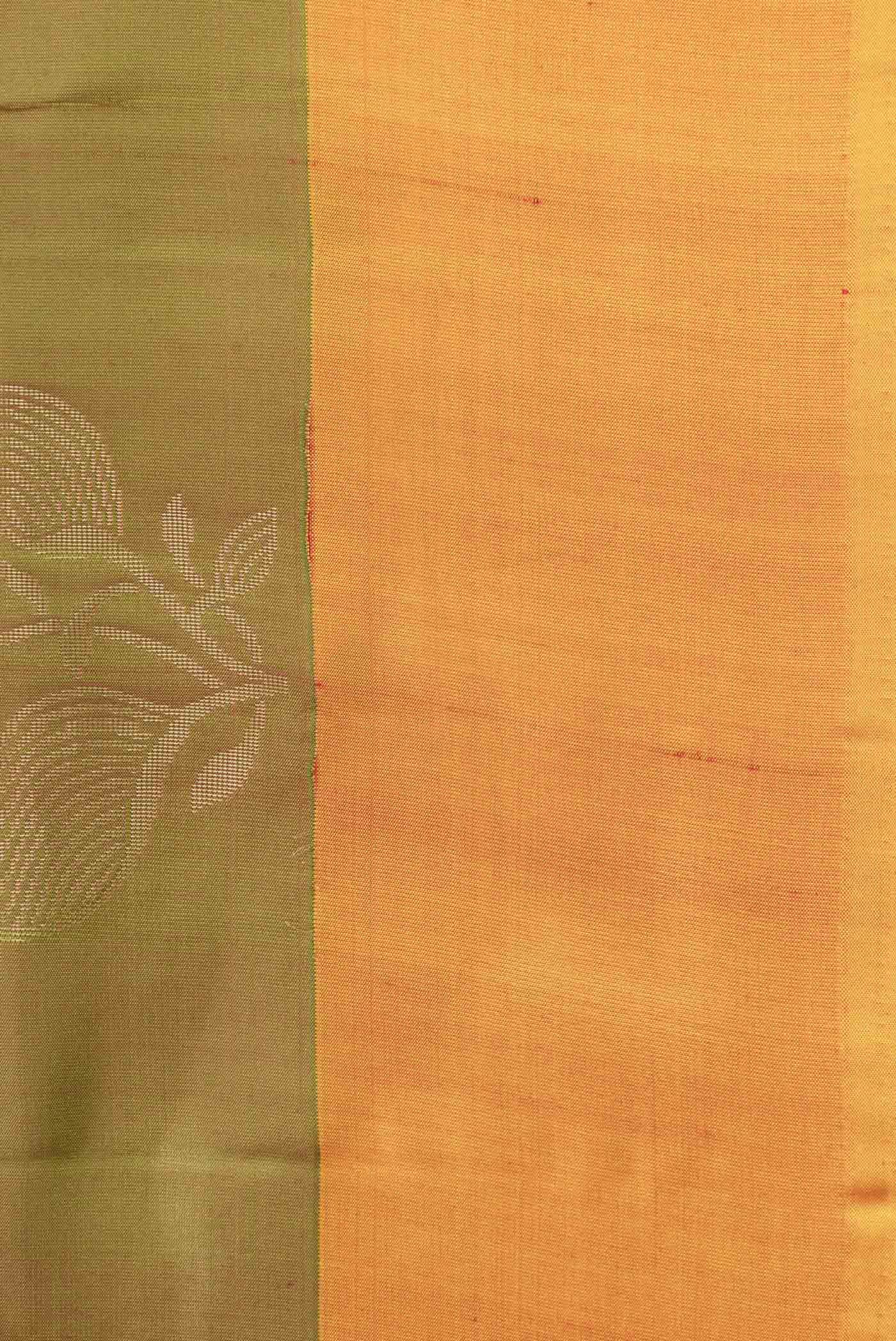 Border image of Green Dual Tone Soft Silk Saree with Zari Butta on the body and Zari Border. 