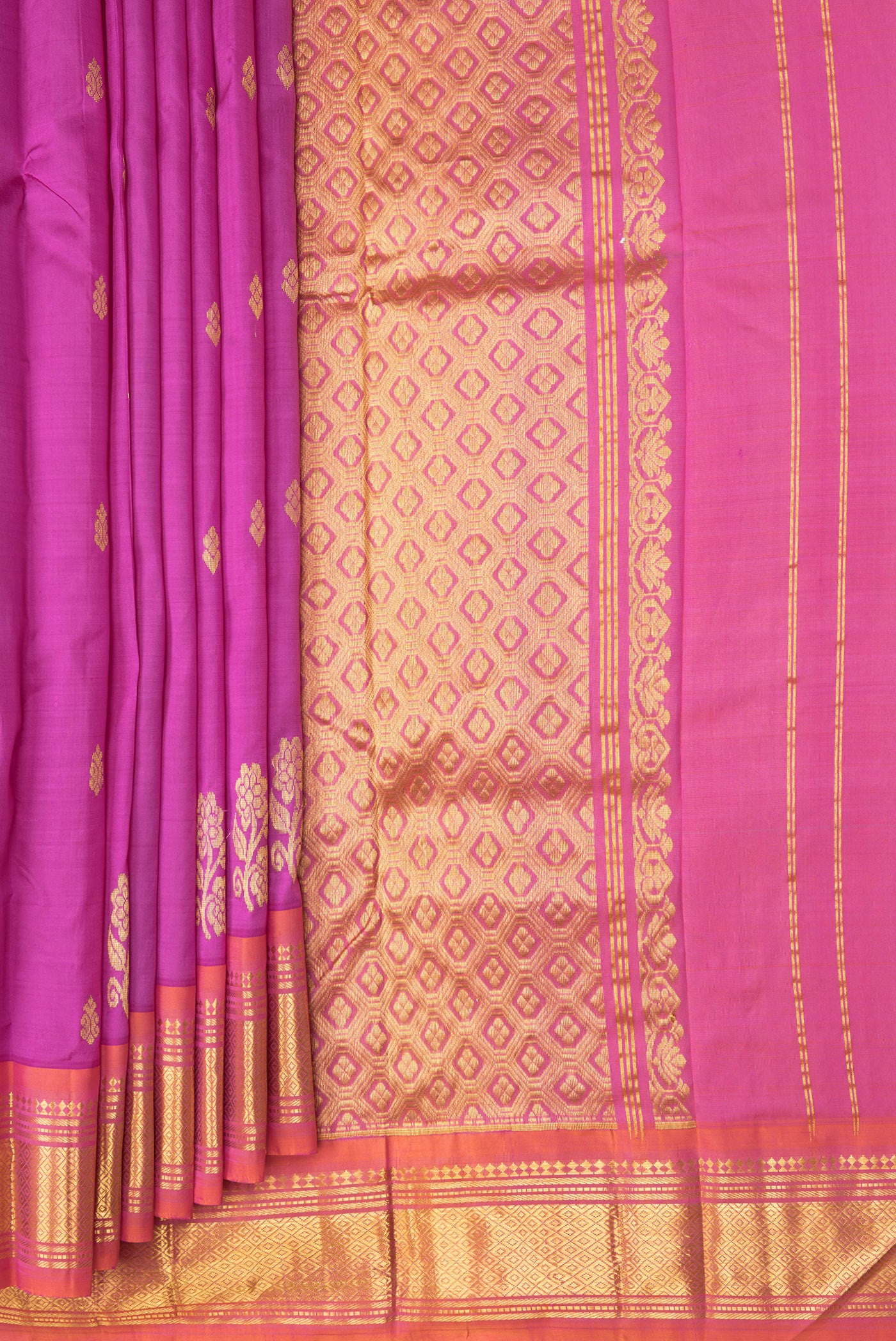 Pleats and pallu of Magenta Kanjivaram Silk Saree with Zari Butta on the body and One Side Border. 