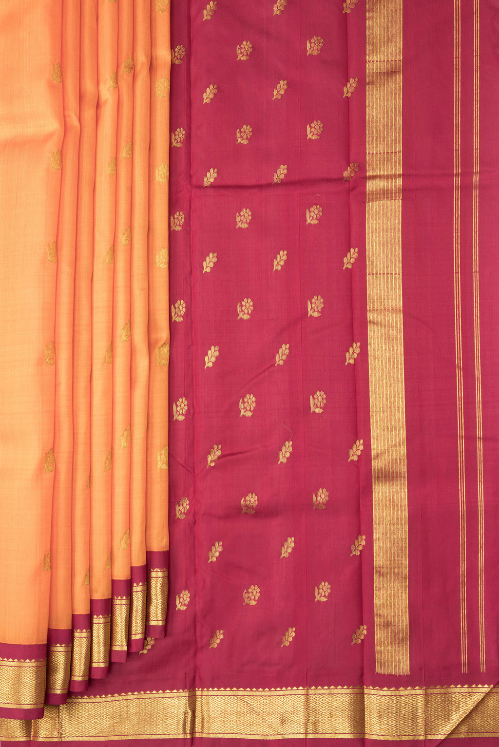 Pleats and pallu of Orange Dual Tone Kanjivaram Silk Saree with Zari Butta on the body and One Side Border. 