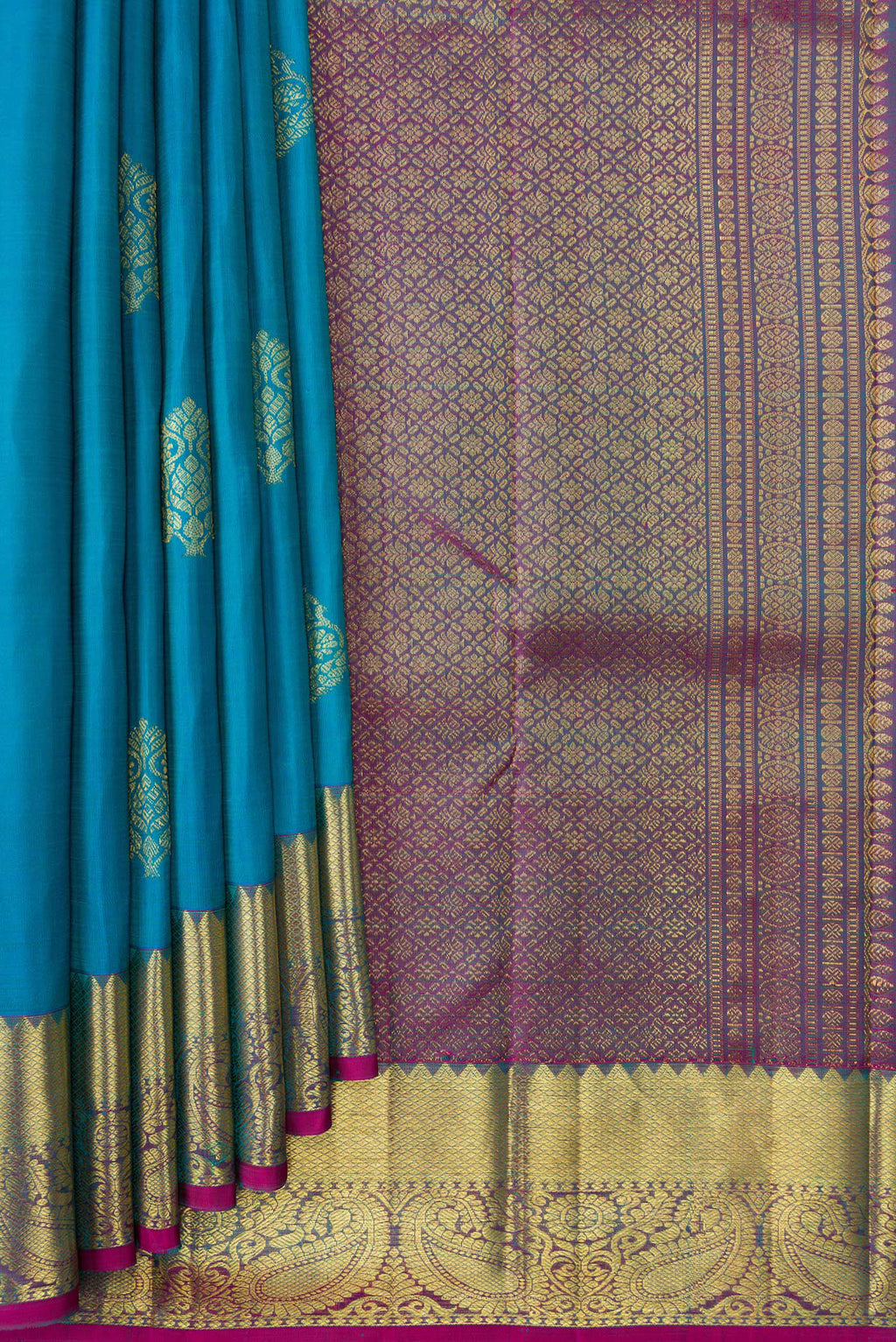 Pleats and pallu of Sky Blue Dual Tone Kanjivaram Silk Saree with Zari Butta on the body and Zari Border. 