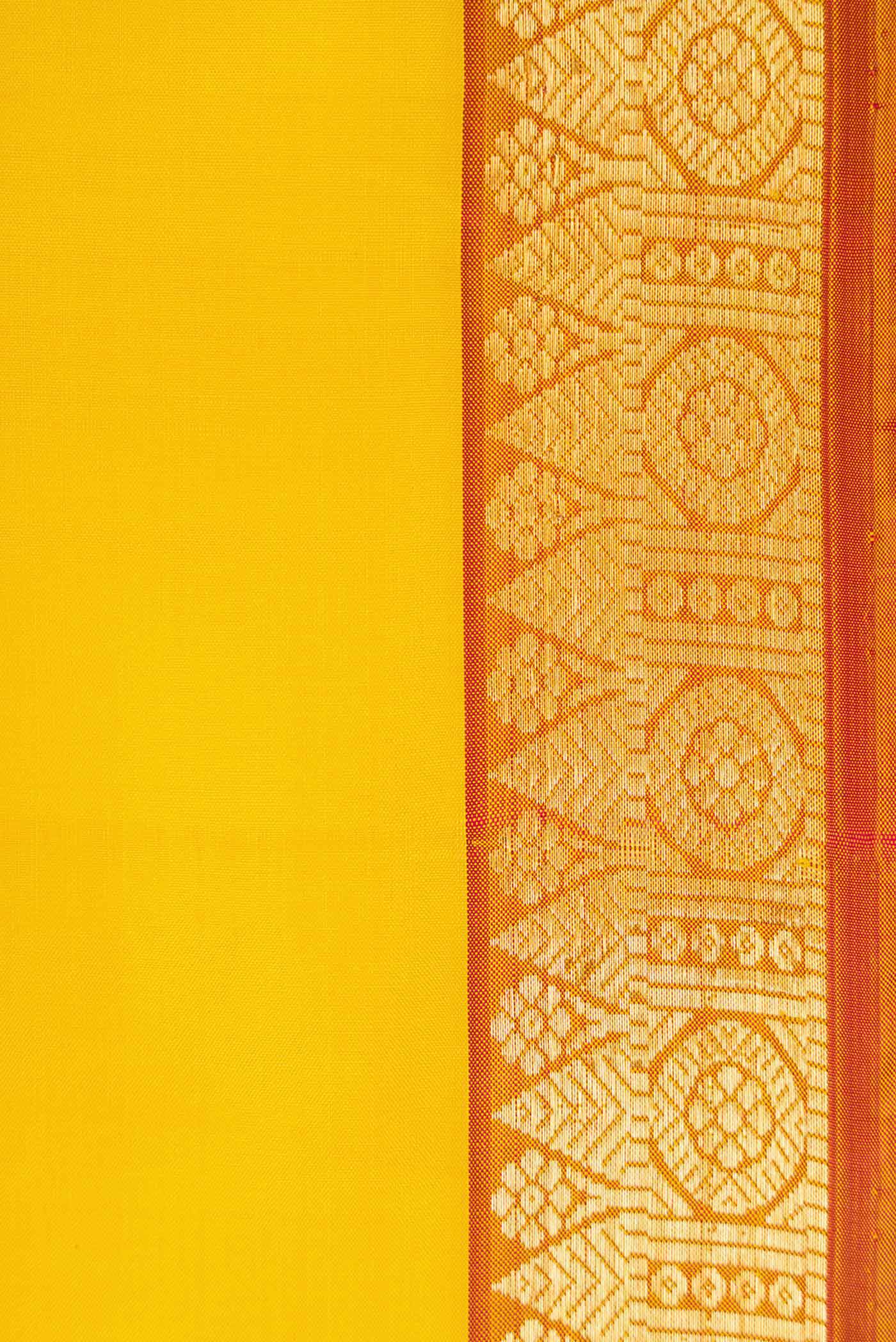 Border image of Lemon Yellow Dual Tone Kanjivaram Silk Saree with Plain Body and Zari Border. 