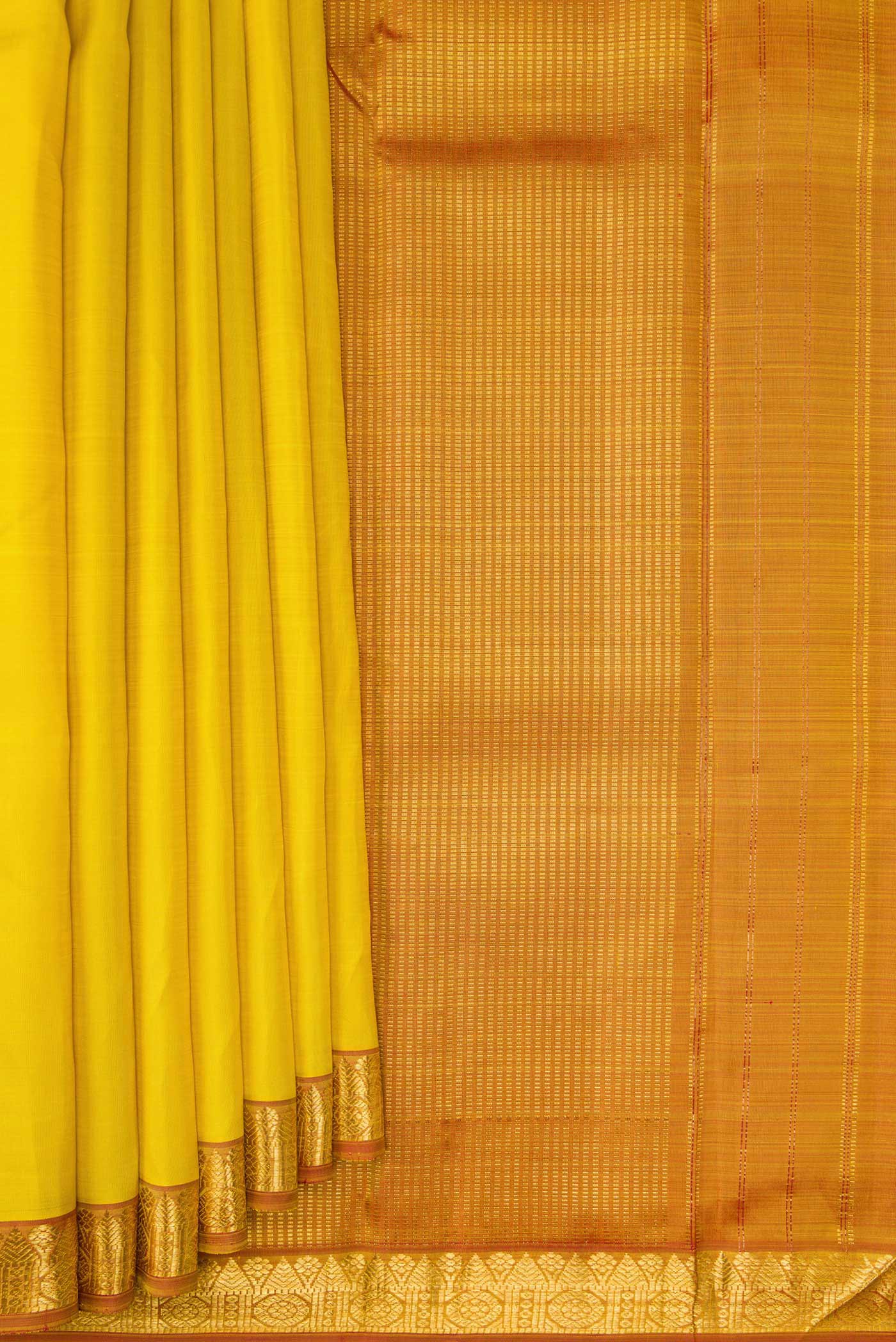 Pleats and pallu of Lemon Yellow Dual Tone Kanjivaram Silk Saree with Plain Body and Zari Border. 