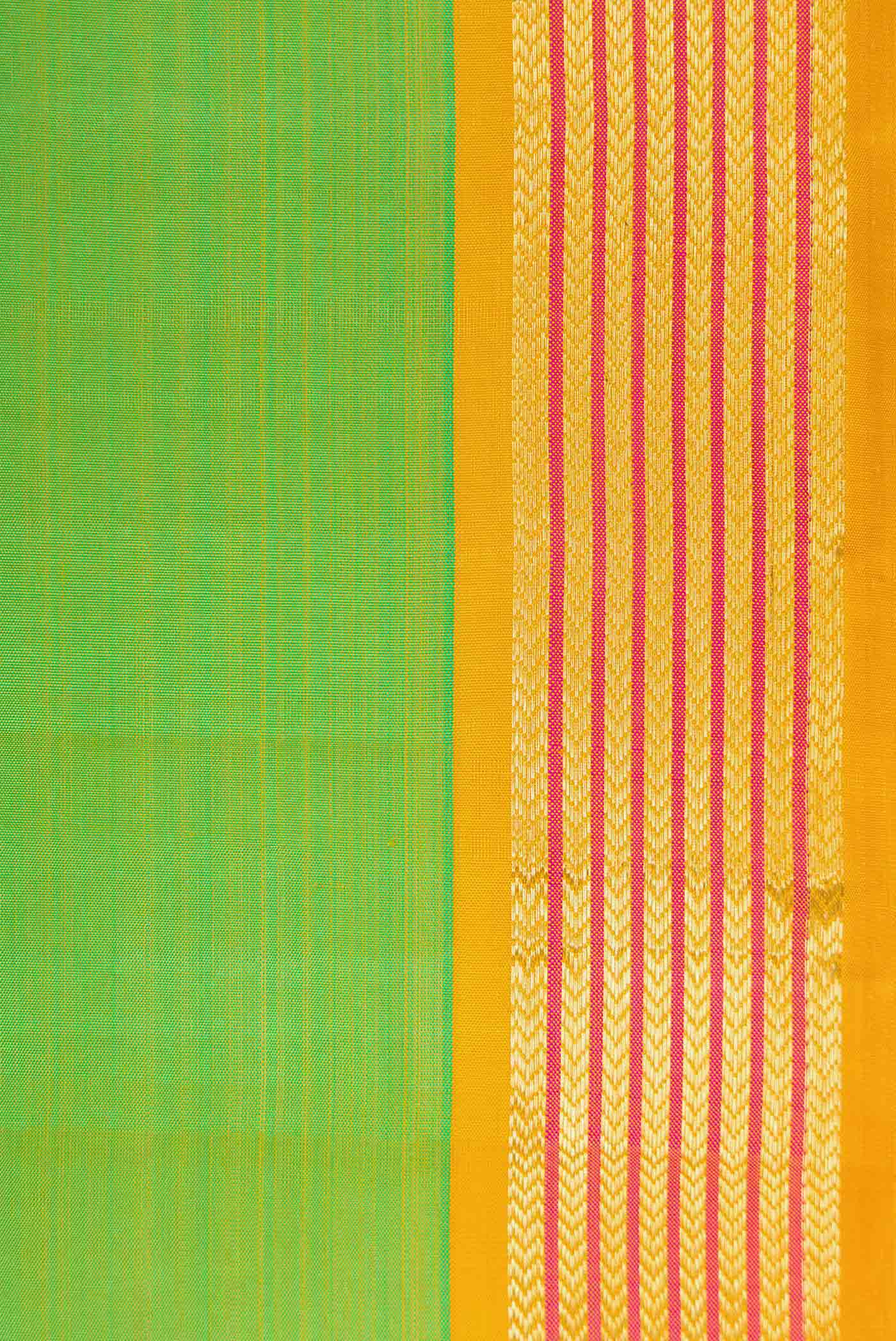 Border image of Parrot Green Dual Tone Kanjivaram Silk Saree with Plain Body and Zari Border. 