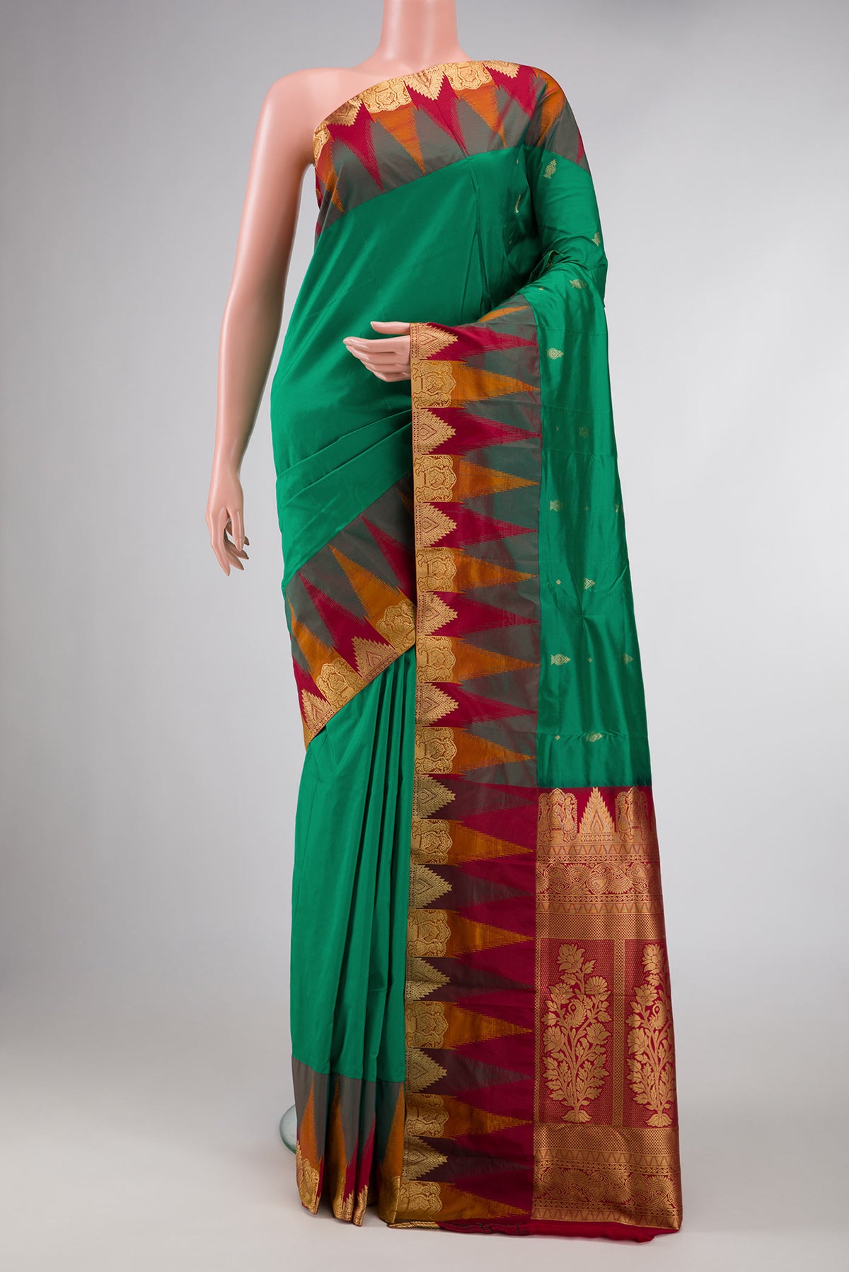 Green Bangalore Silk Saree with Zari Butta on the body and Temple Border displayed on a mannequin