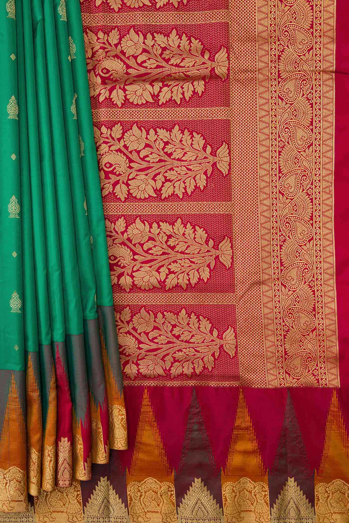 Pleats and pallu of Green Bangalore Silk Saree with Zari Butta on the body and Temple Border