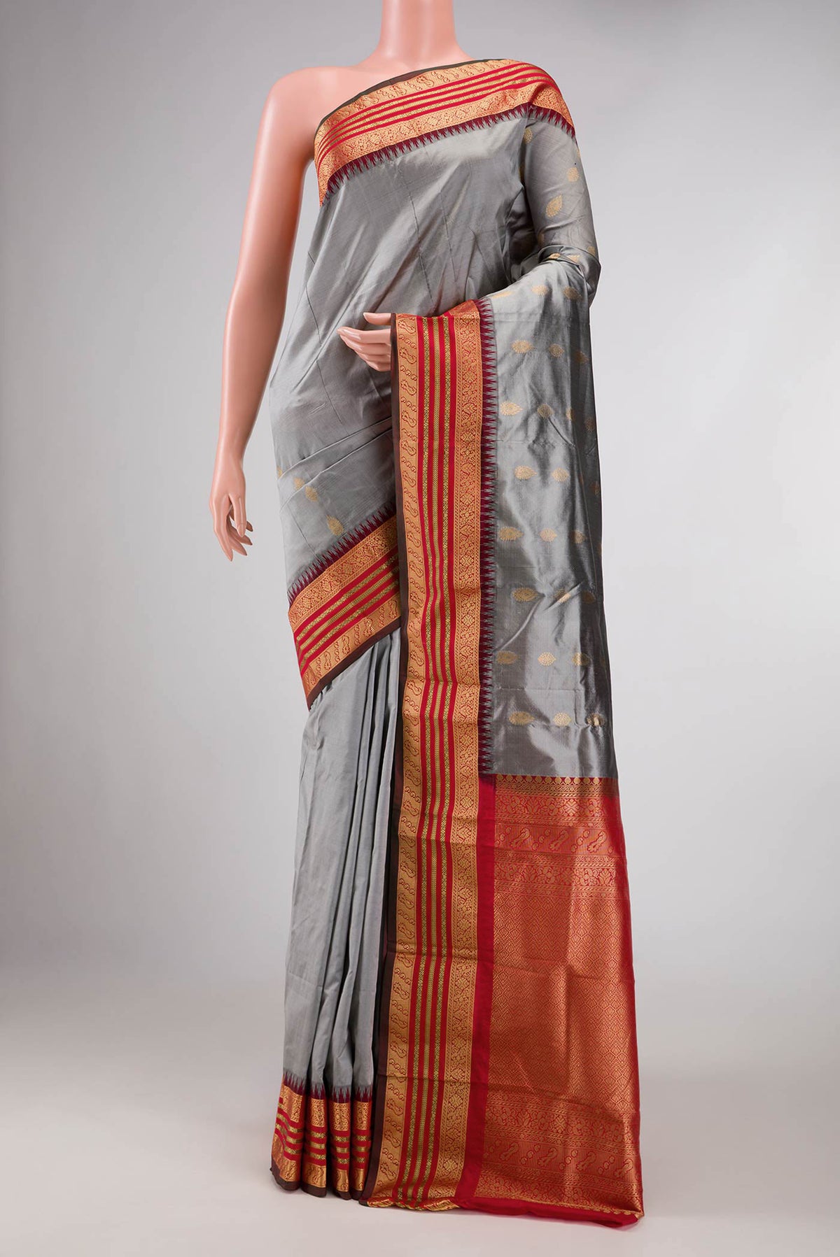 Grey Bangalore Silk Saree with Zari Butta on the body and Temple Border displayed on a mannequin