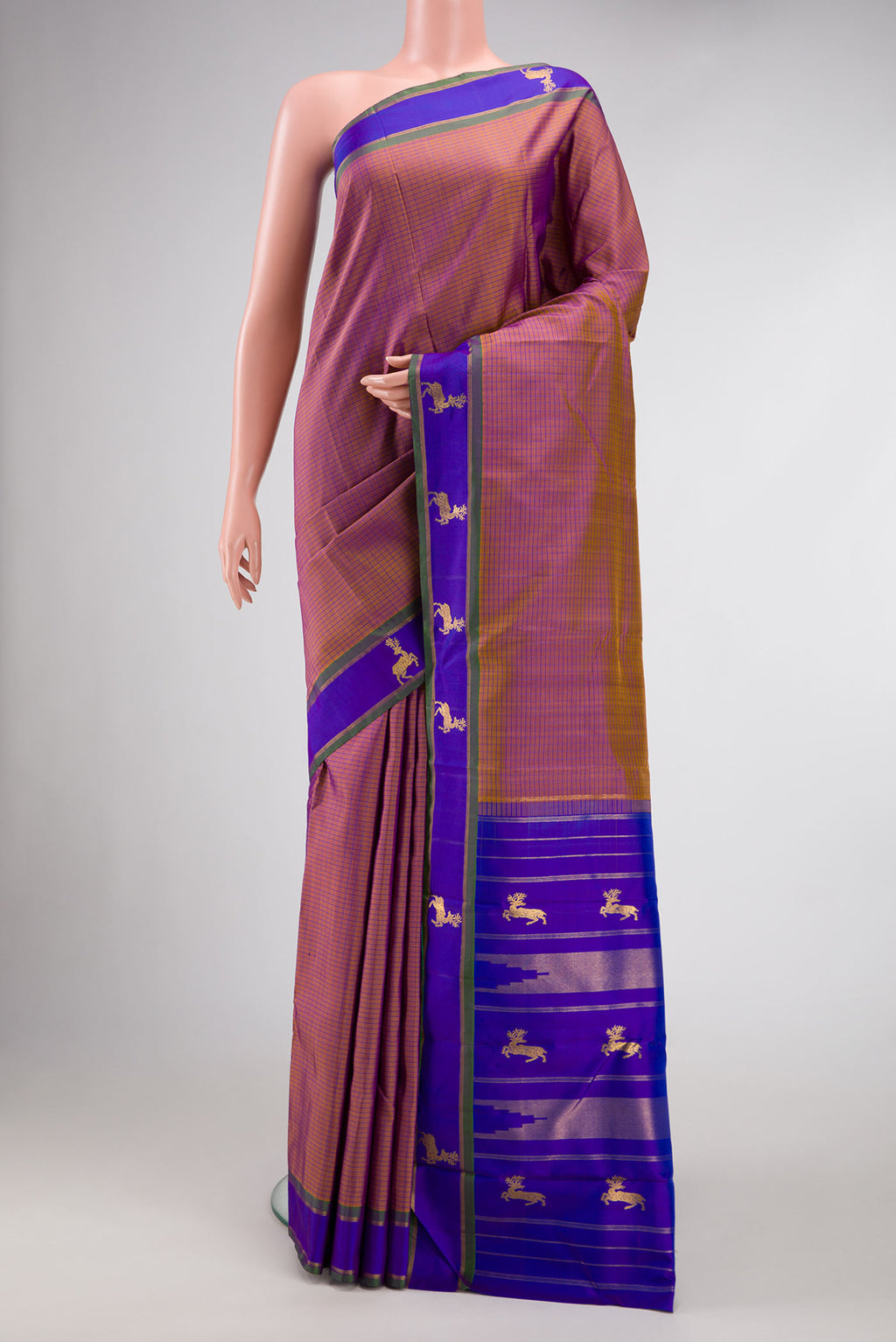 Brown Dual Tone Kanchipuram Silk Saree with Checked design on the body and Fancy Border.  displayed on a mannequin
