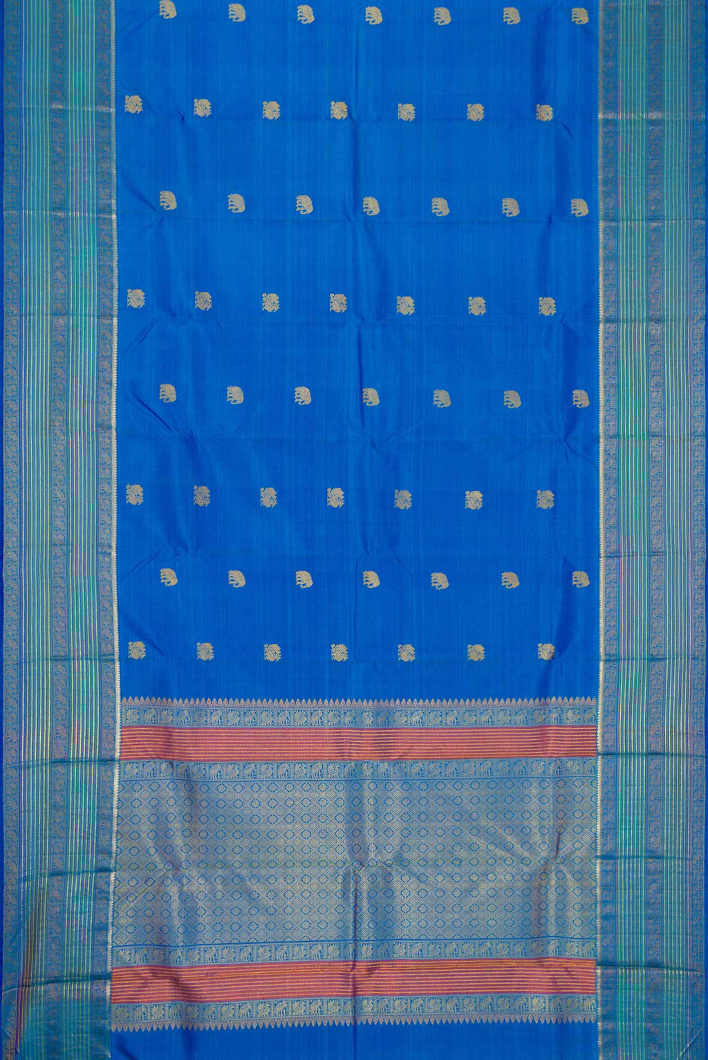 Flat view of Royal Blue Dual Tone Kanjivaram Silk Saree with Thread Butta on the body and Zari And Thread Border. 