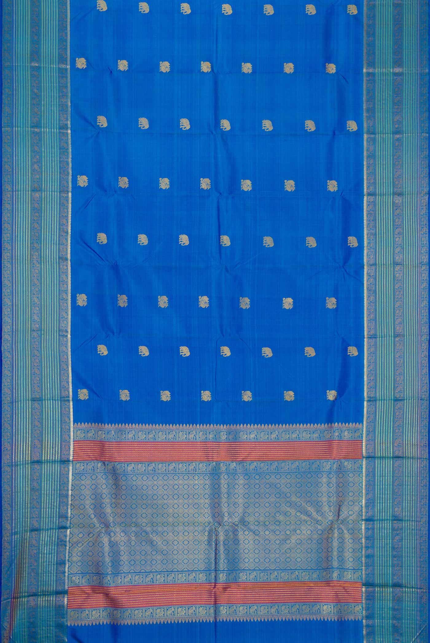 Flat view of Royal Blue Dual Tone Kanjivaram Silk Saree with Thread Butta on the body and Zari And Thread Border. 