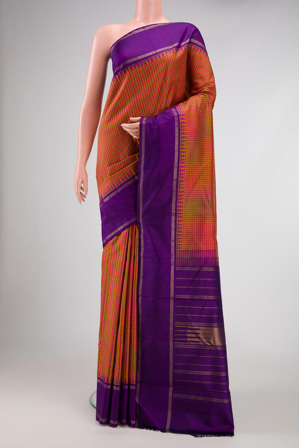 Pink, Green and Orange Color Kanjivaram Silk Saree with Checked design on the body and Zari Border.  displayed on a mannequin