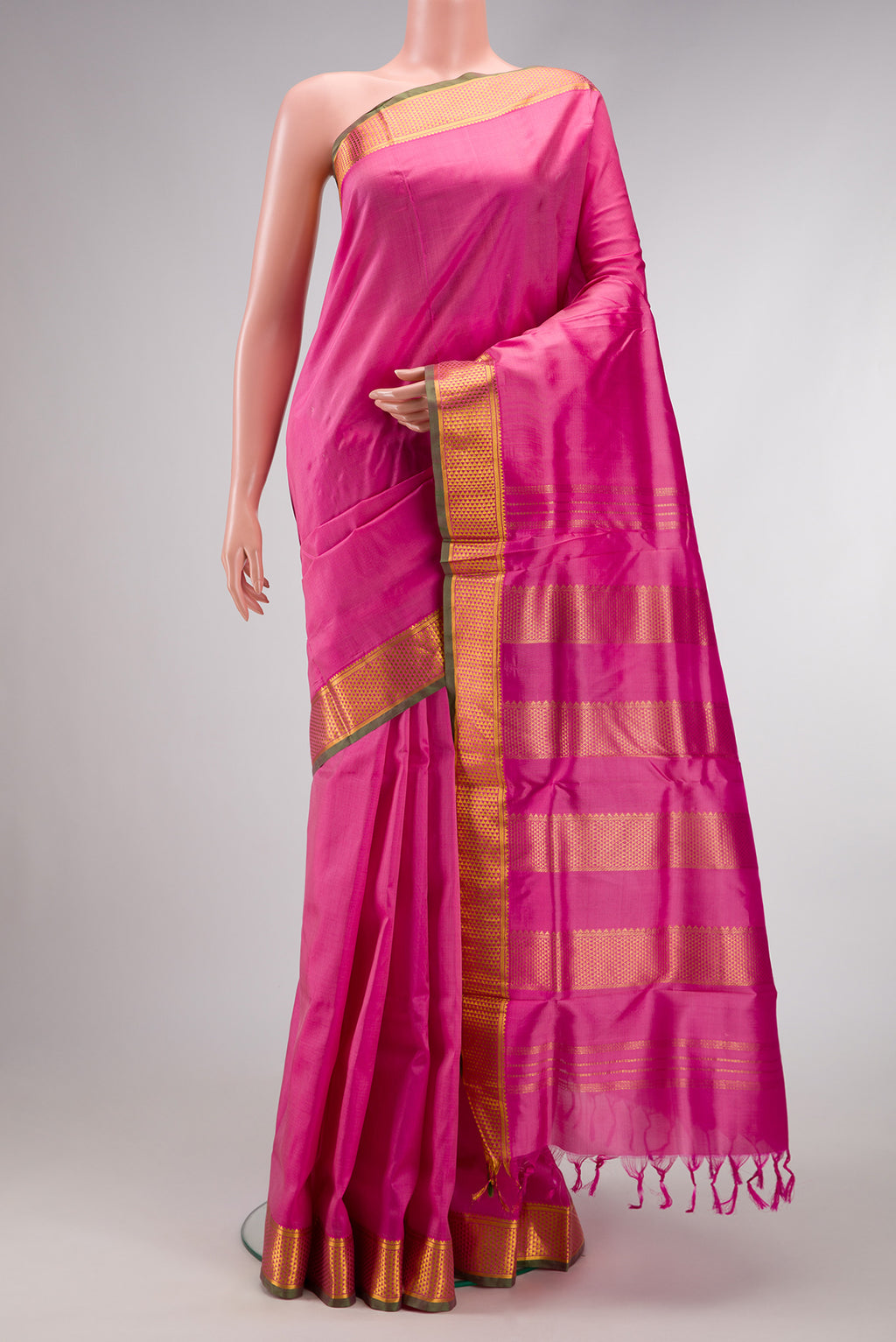 Pink Dual Tone Kanchipuram Silk Nine Yards Saree with Plain Body and Zari Border.  displayed on a mannequin