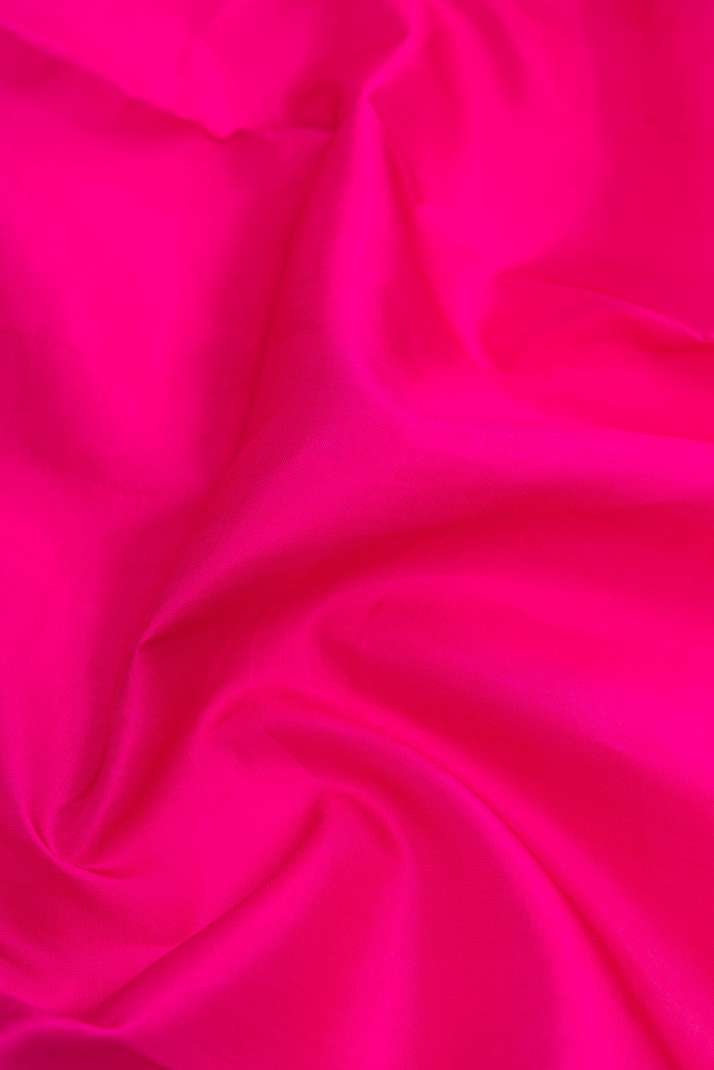 Close up of Pink Dual Tone Kanjivaram Silk Nine Yards Saree with Plain Body and Zari Border.  displaying folds