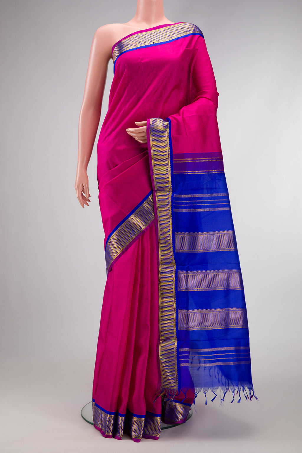 Pink Dual Tone Kanjivaram Silk Nine Yards Saree with Plain Body and Zari Border.  displayed on a mannequin