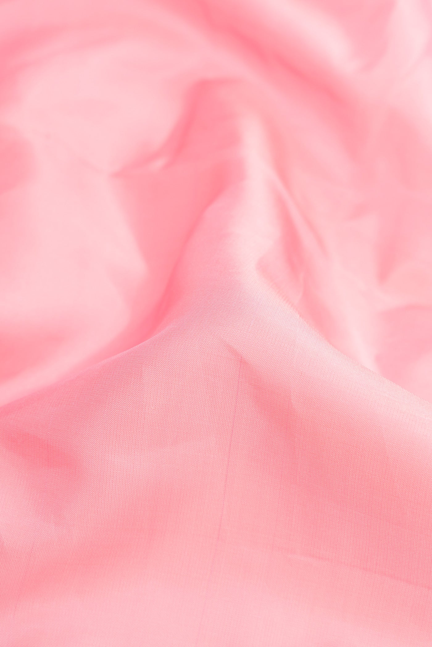 Close up of Pink Dual Tone Kanjivaram Silk Nine Yards Saree with Plain Body and Zari Border.  displaying folds
