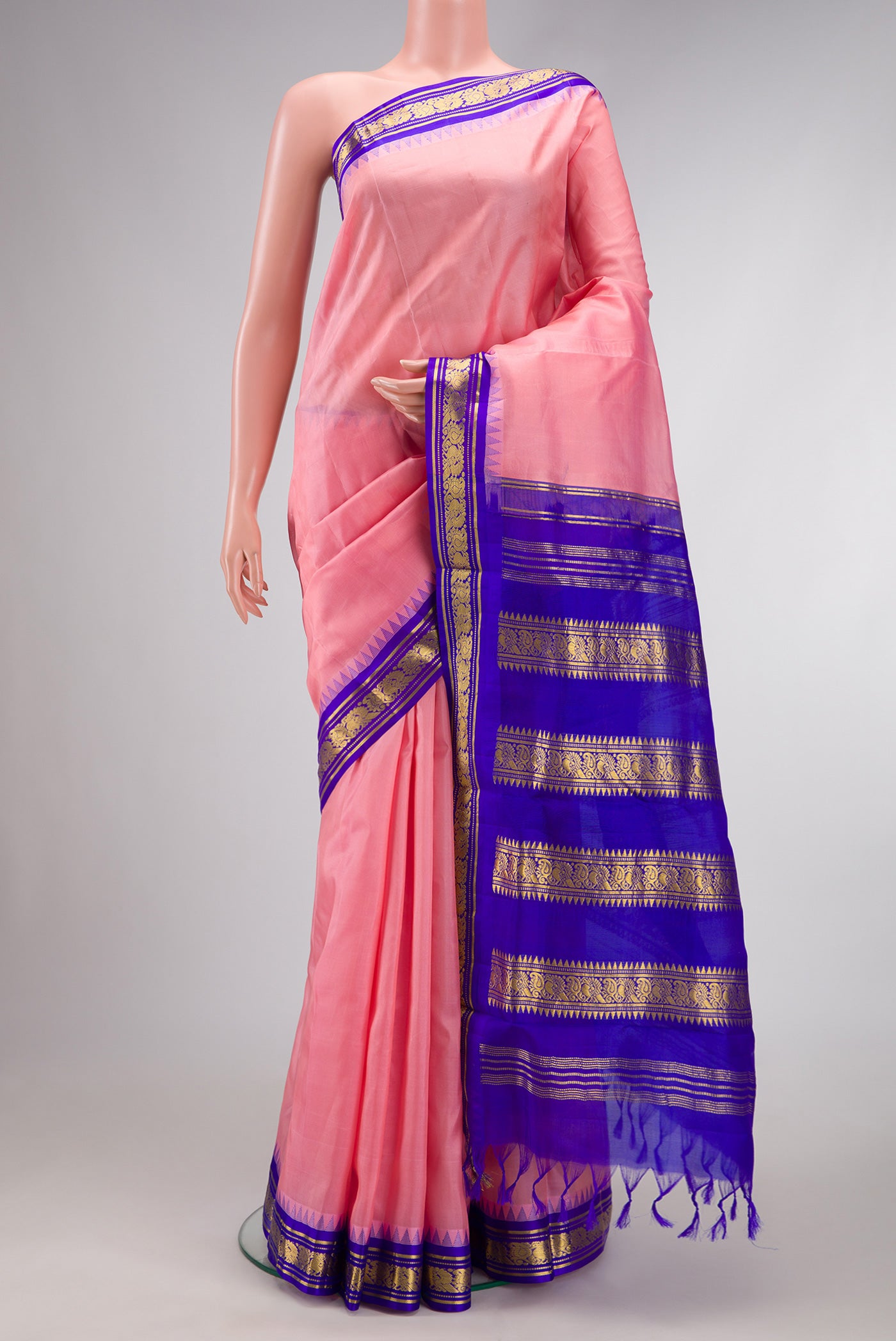 Pink Dual Tone Kanjivaram Silk Nine Yards Saree with Plain Body and Zari Border.  displayed on a mannequin