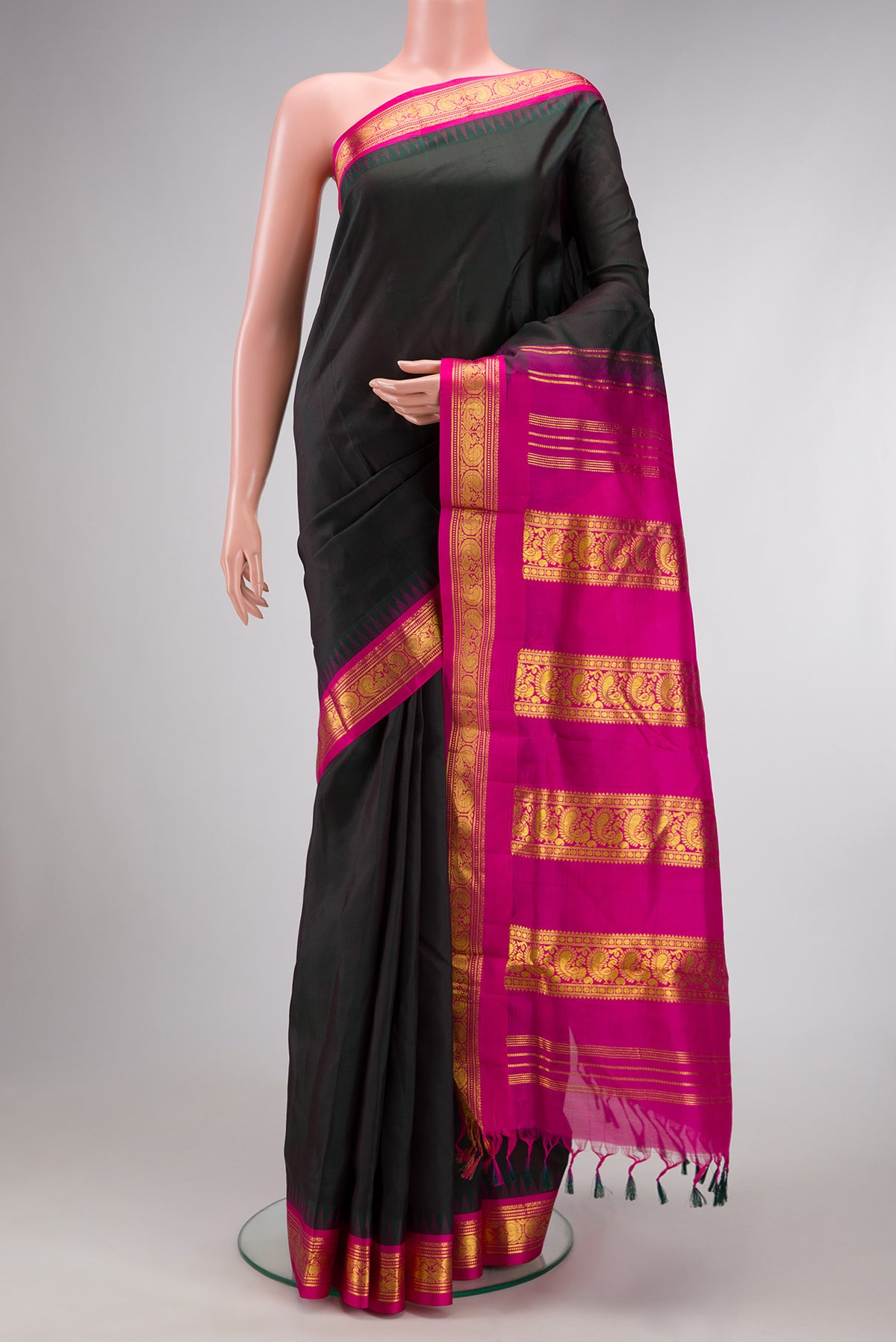Black Dual Tone Kanjivaram Silk Nine Yards Saree with Plain Body and Zari Border.  displayed on a mannequin