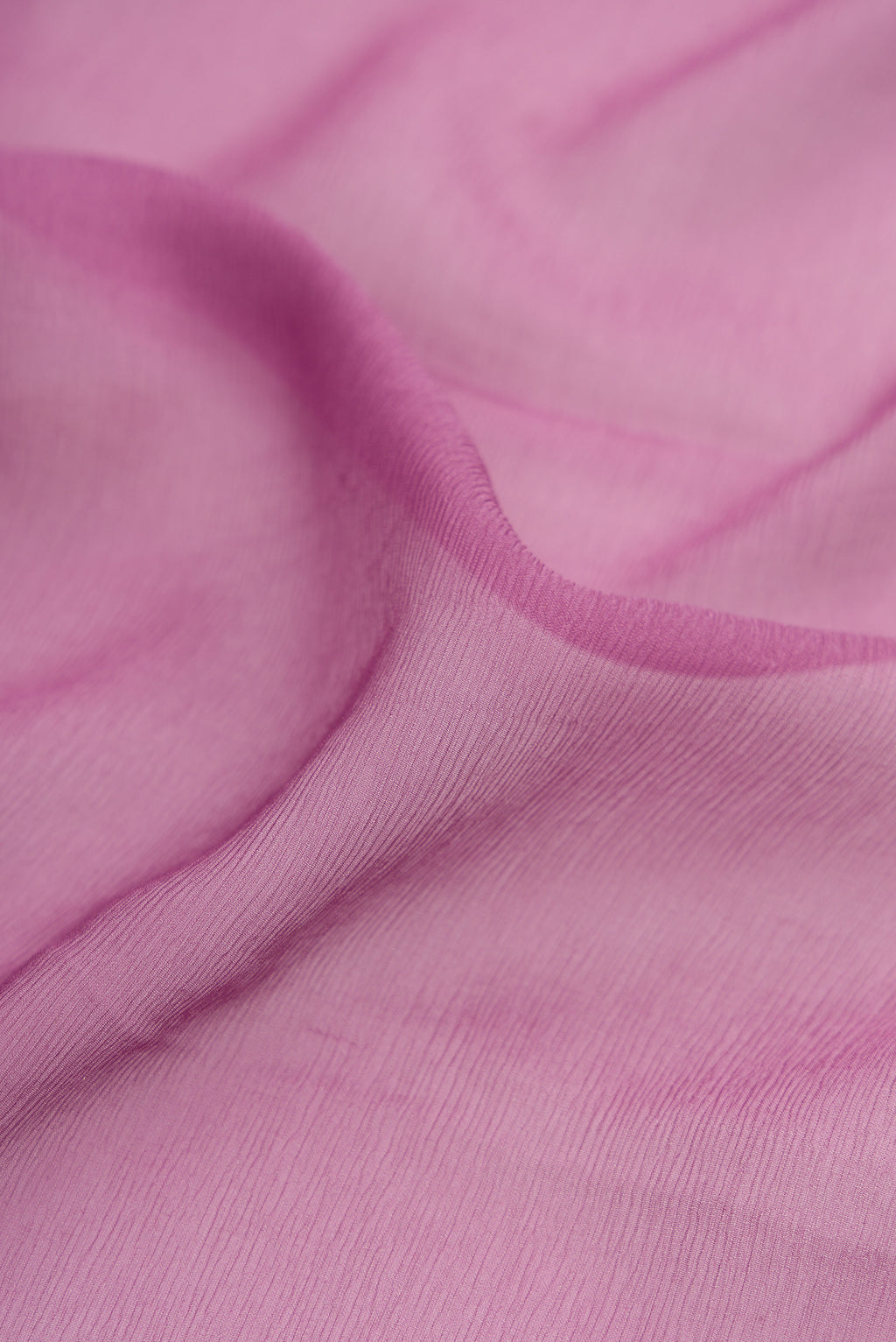 Close up of Lavender Mysore Chiffon Saree with Plain Body and Plain Border.  displaying folds