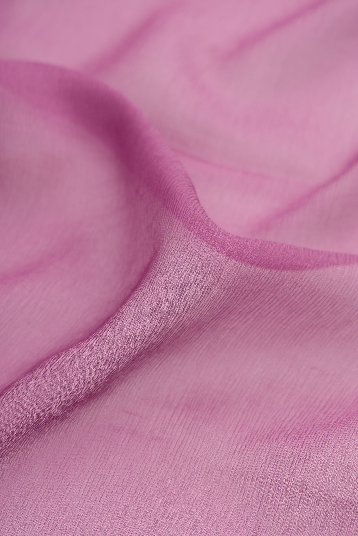 Close up of Lavender Mysore Chiffon Saree with Plain Body and Plain Border.  displaying folds