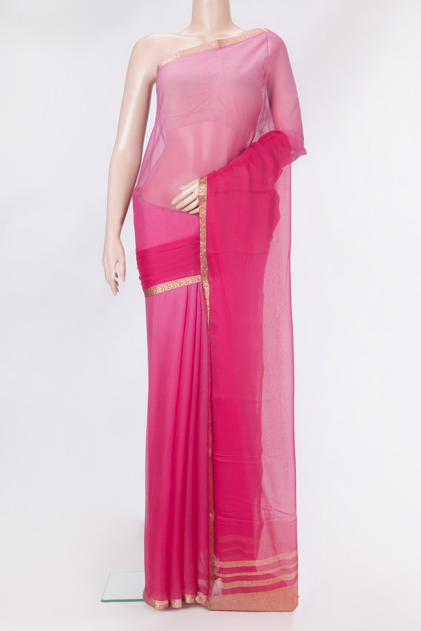 Pink Mysore Chiffon Saree with Ombre design on the body and Zari Border.  displayed on a mannequin