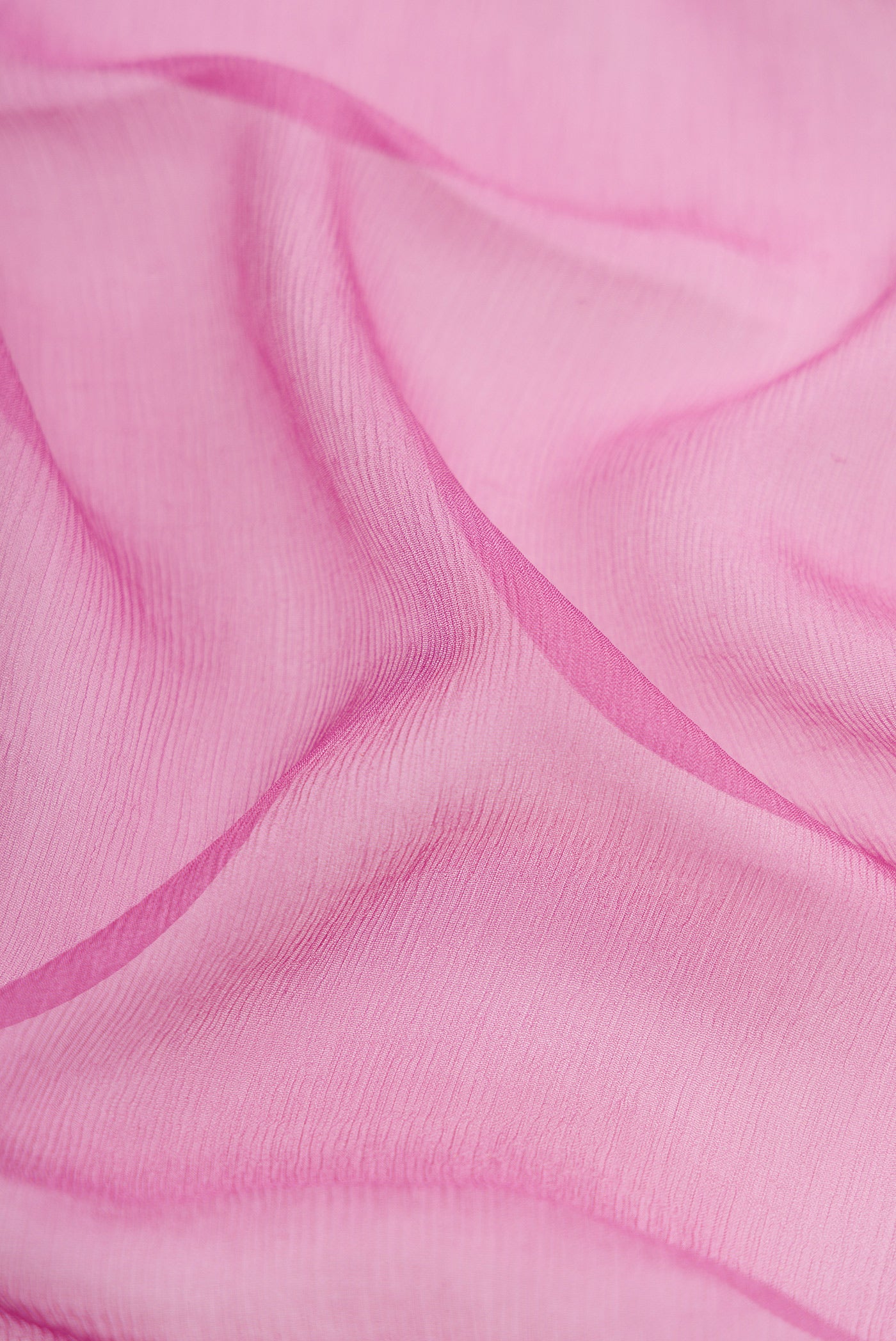 Close up of Lavender Mysore Chiffon Saree with Plain Body and Zari Border.  displaying folds