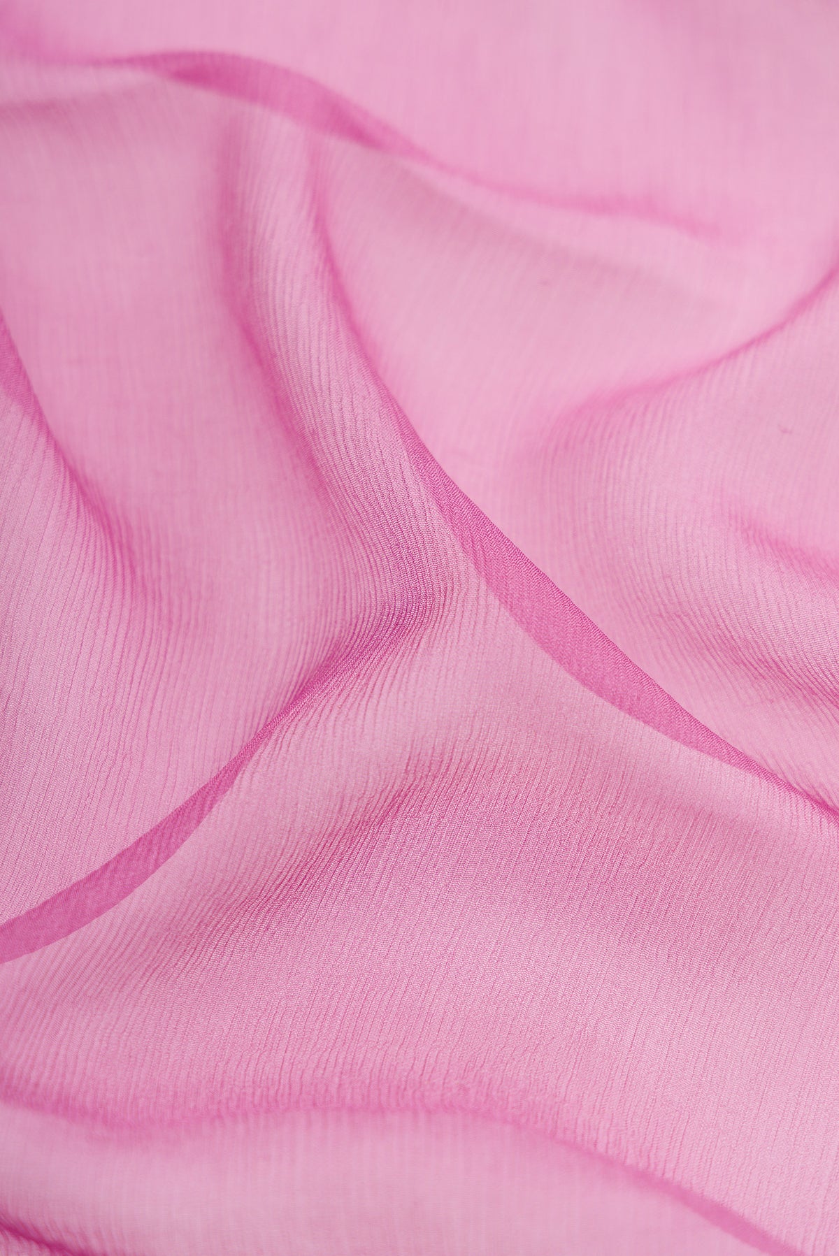 Close up of Lavender Mysore Chiffon Saree with Plain Body and Zari Border.  displaying folds