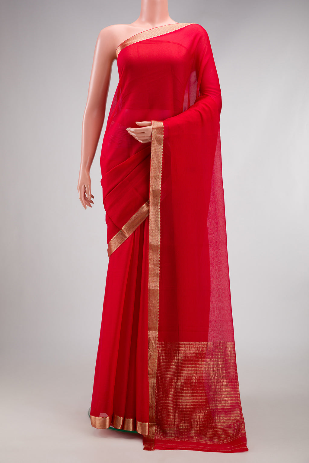 Red Mysore Chiffon Saree with Plain Body and Zari Border.  displayed on a mannequin