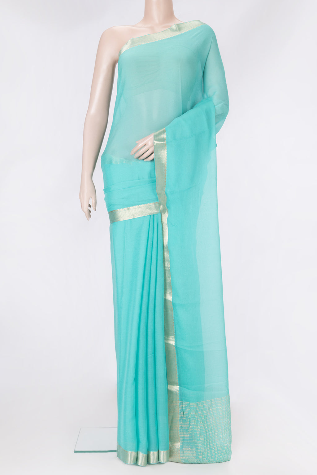 Sky Blue Mysore Chiffon Saree with Plain Body and Zari Border.  displayed on a mannequin