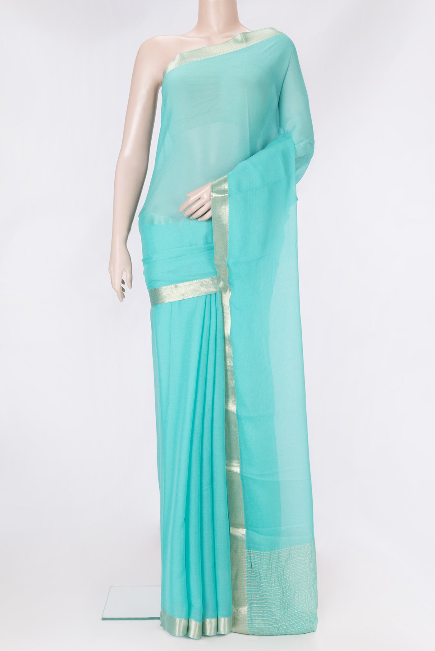 Sky Blue Mysore Chiffon Saree with Plain Body and Zari Border.  displayed on a mannequin