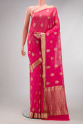 Pink Mysore Georgette Saree with Zari Butta on the body and Zari Border.  displayed on a mannequin