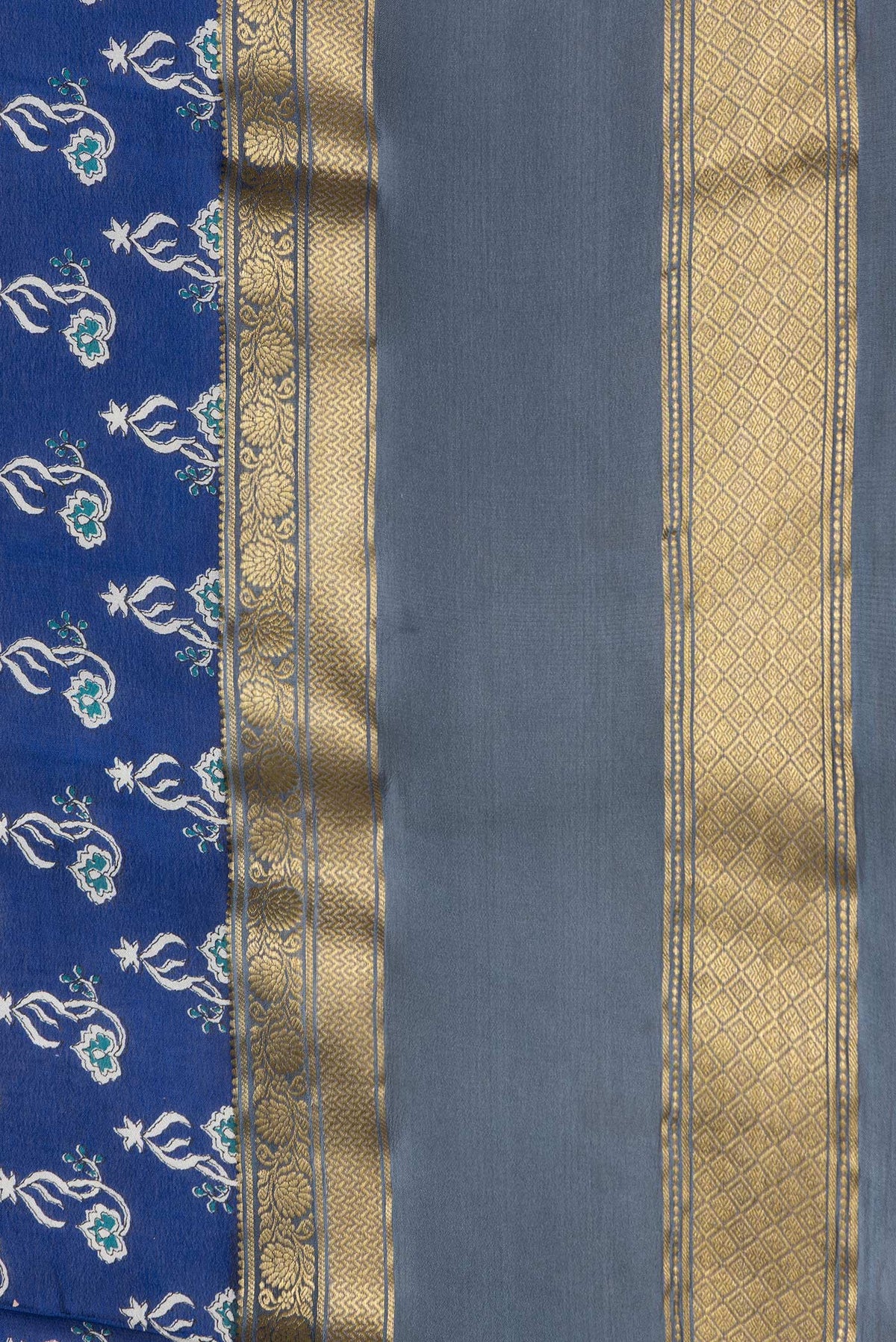 Border image of Navy Blue Dual Tone Mysore Crepe Saree with Printed design on the body and Zari Border. 