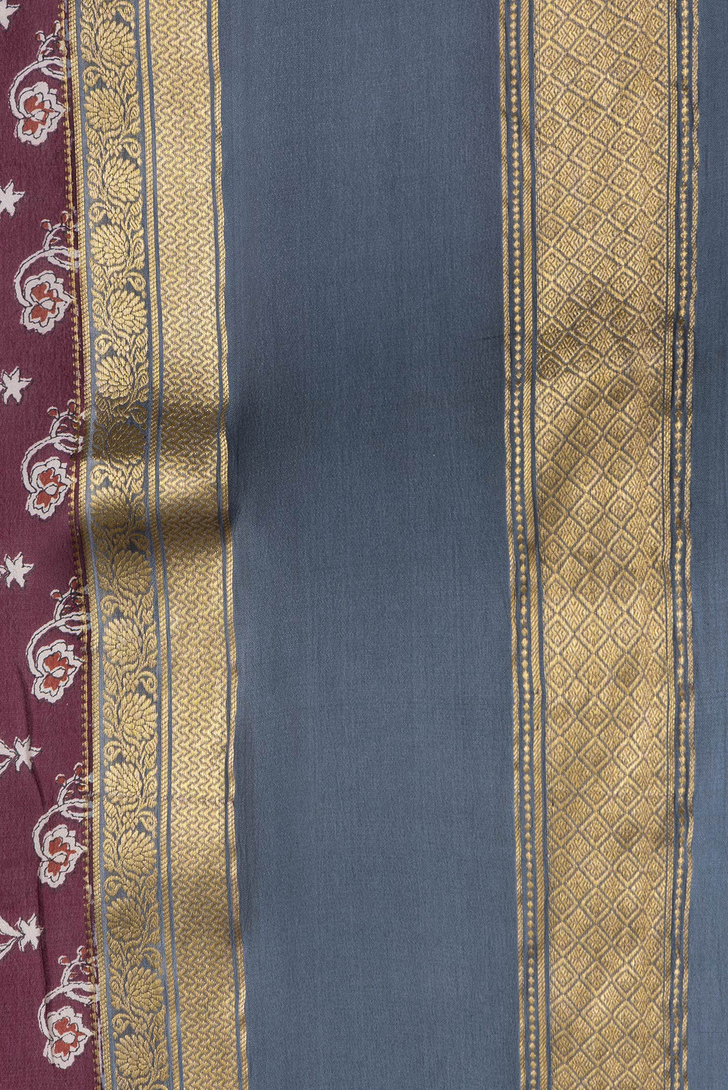 Border image of Maroon Dual Tone Mysore Crepe Saree with Printed design on the body and Zari Border. 