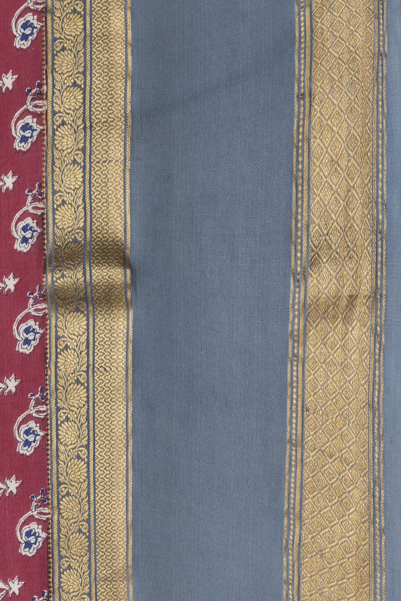 Border image of Maroon Dual Tone Mysore Crepe Saree with Printed design on the body and Zari Border. 