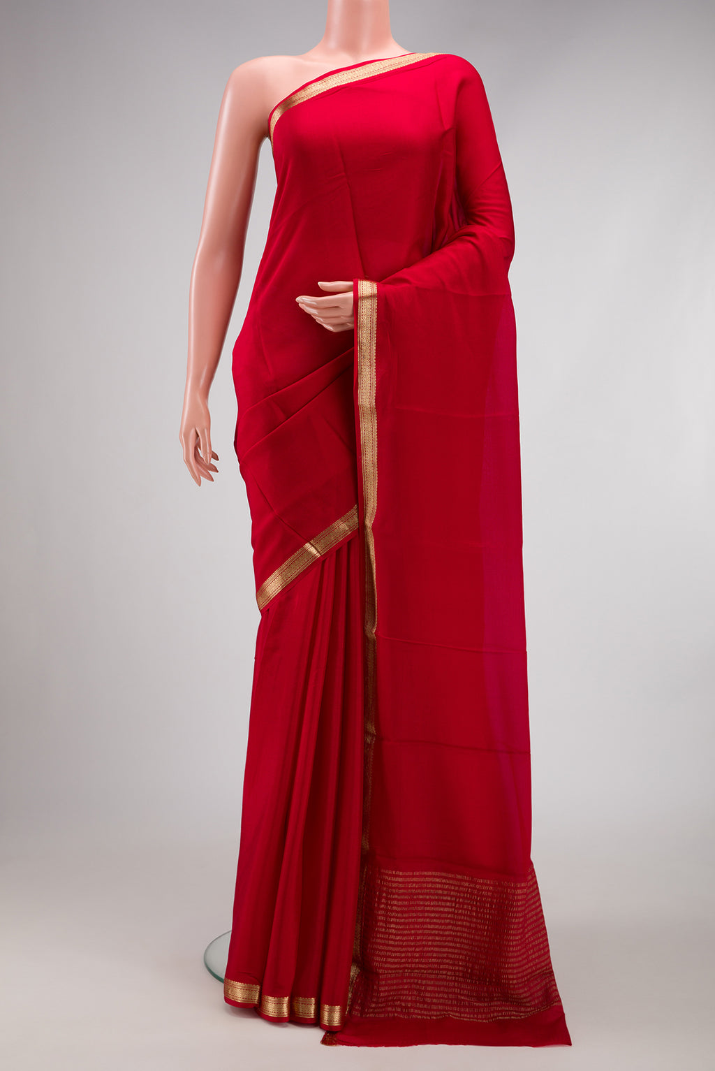 Red Dual Tone Mysore Crepe Saree with Plain Body and Zari Border.  displayed on a mannequin