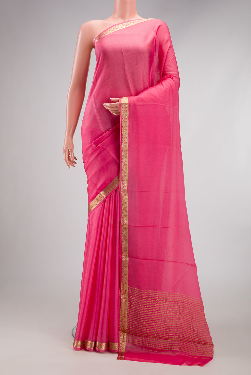Pink Dual Tone Mysore Crepe Saree with Plain Body and Zari Border.  displayed on a mannequin