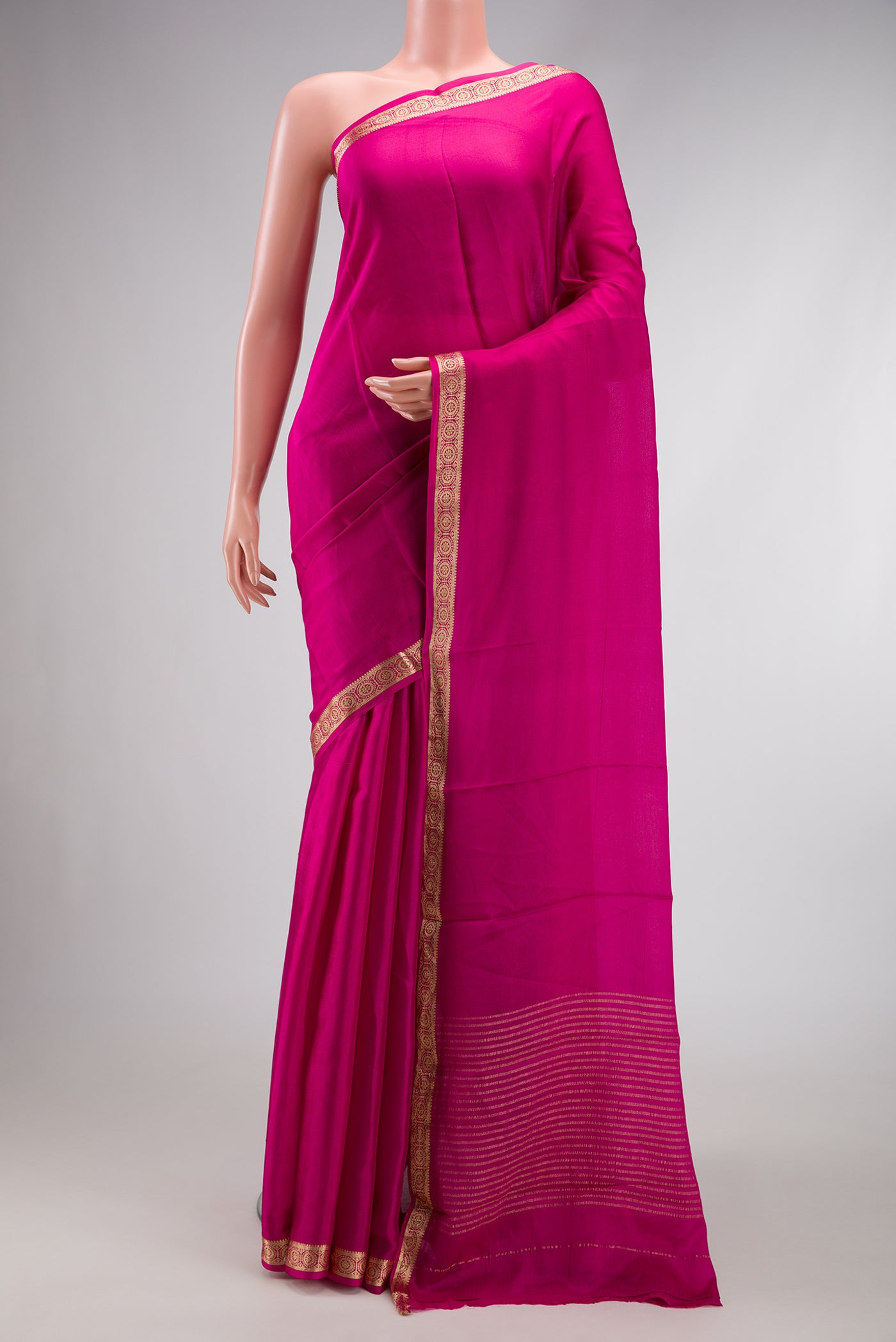 Dark Pink Dual Tone Mysore Georgette Saree with Plain Body and Zari Border.  displayed on a mannequin
