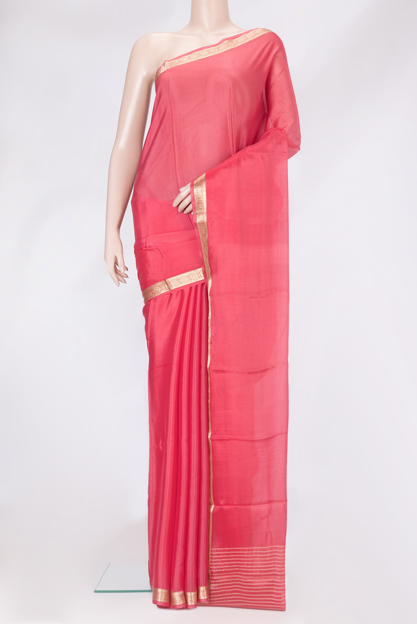 Pink Dual Tone Georgette Saree with Plain Body and Zari Border.  displayed on a mannequin
