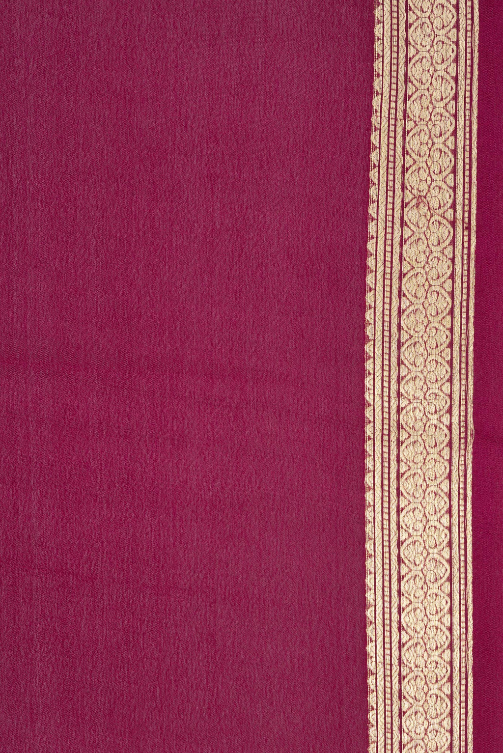 Border image of Magenta Dual Tone Georgette Saree with Plain Body and Zari Border. 