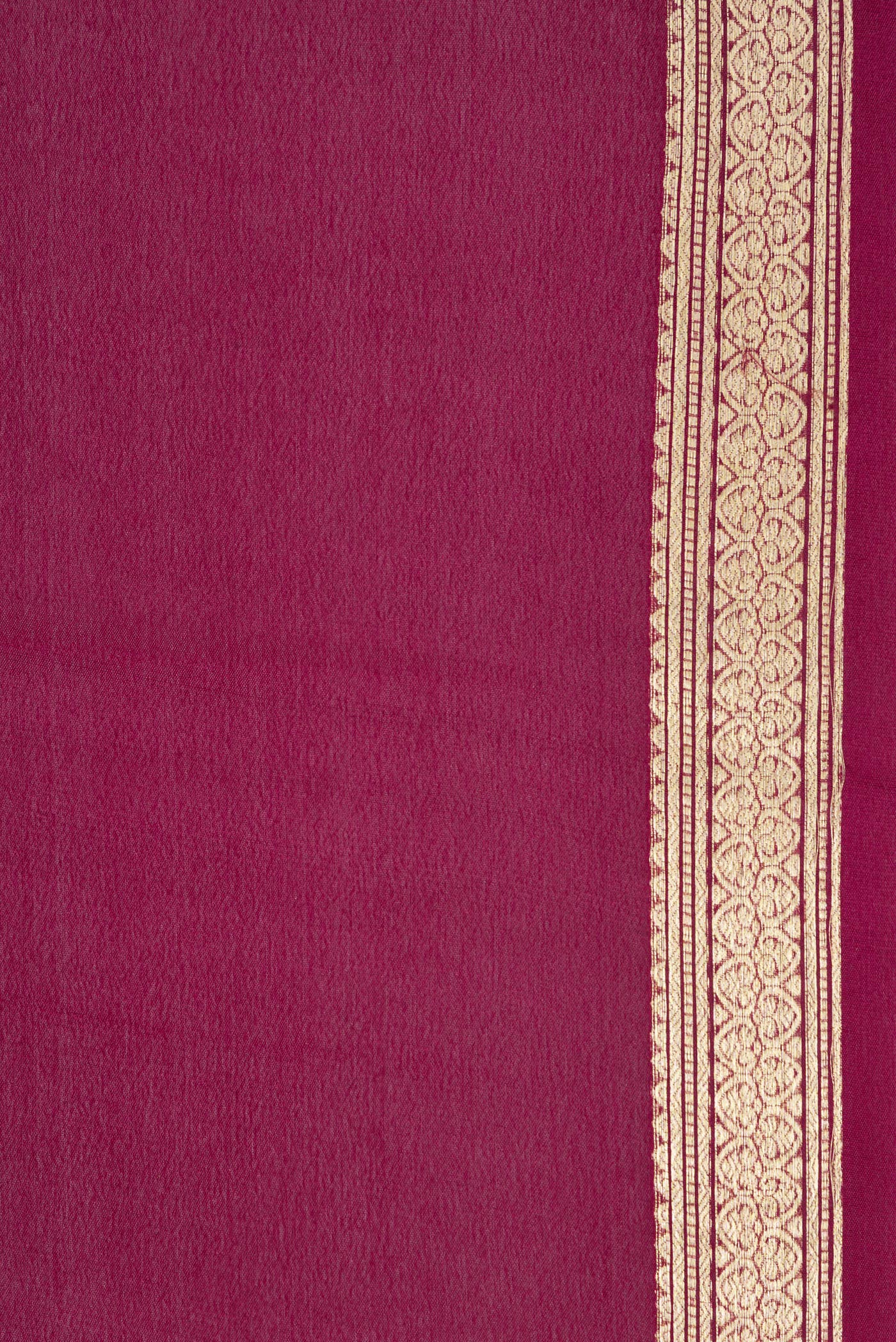 Border image of Magenta Dual Tone Georgette Saree with Plain Body and Zari Border. 